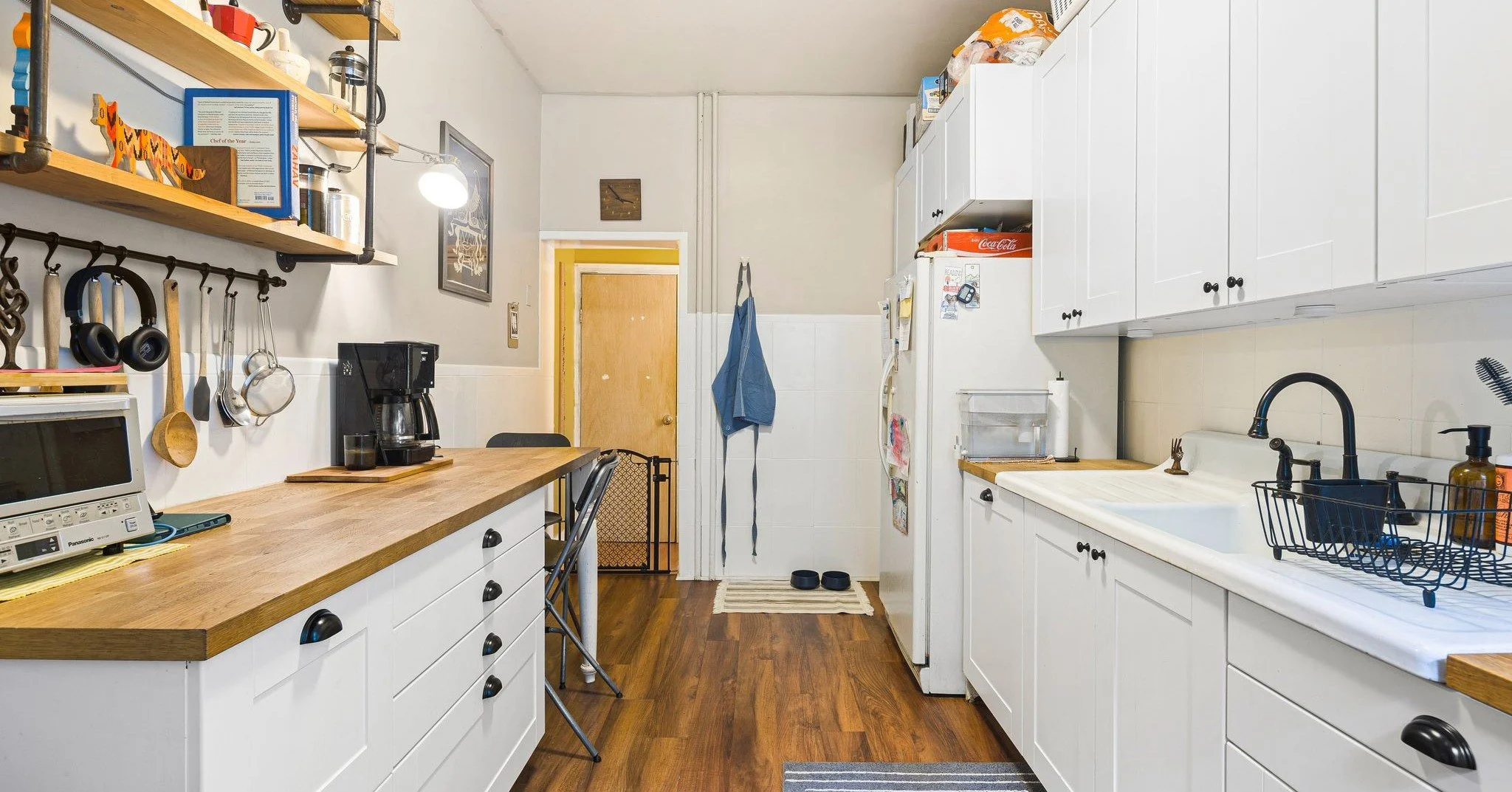 A great big home filled with artistic love. With 4 proper (aka substantial sized!) bedrooms, an oversized bathroom with a laundry set up, a big back yard that is made for friends to hang and kiddos to play and a finished basement that has a half bath