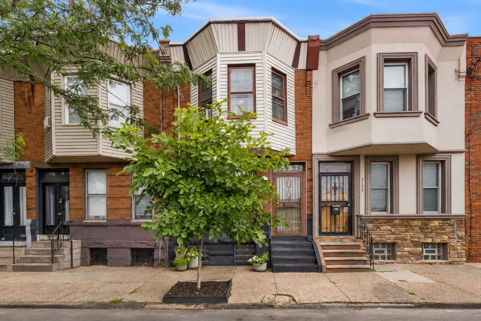 Charm? Check! Location? Check! Fresh Price? Check! 

This Port Richmond sweetheart of a home is looking for a new owner. It was lovingly restored in 2022 it has inviting curb appeal, a stunner of a vestibule with double doors that open into the first