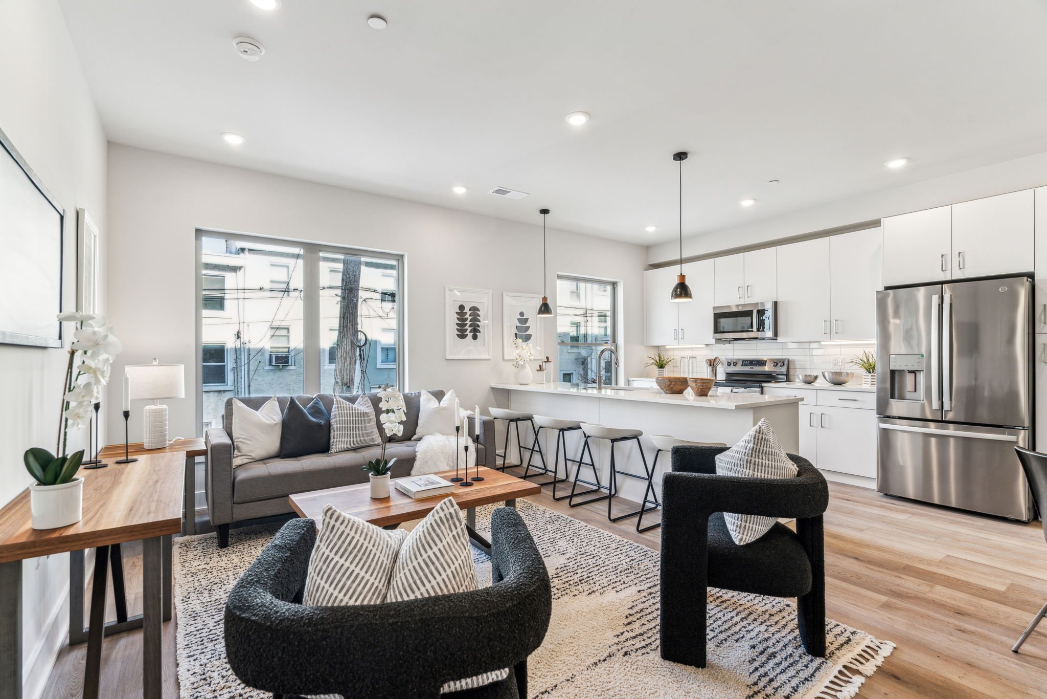 ONLY TWO UNITS LEFT! Need easy parking? You've got a private garage? Want room to lounge, live and relax? You've got it with a clever floor plan that incorporates a sunny layout including a bonus den downstairs, second floor laundry, and a green roof