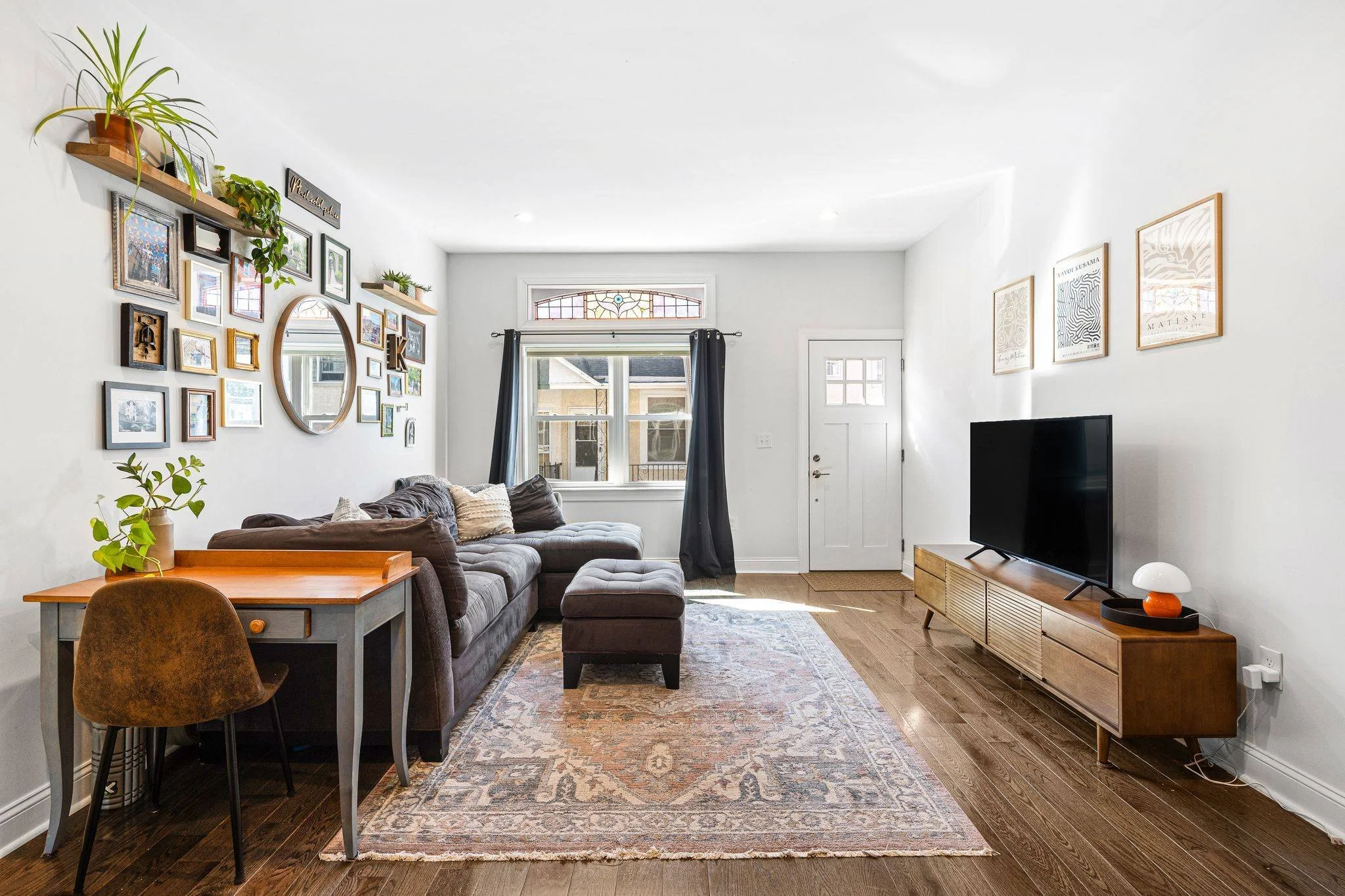 Hey Manayunk/Roxborough lovers! We've got a move-in ready that hit the market today. A bright first floor welcomes you in. On a sunny day you may catch the light through the stained glass eyebrow window that frames the living room. Pass through the c