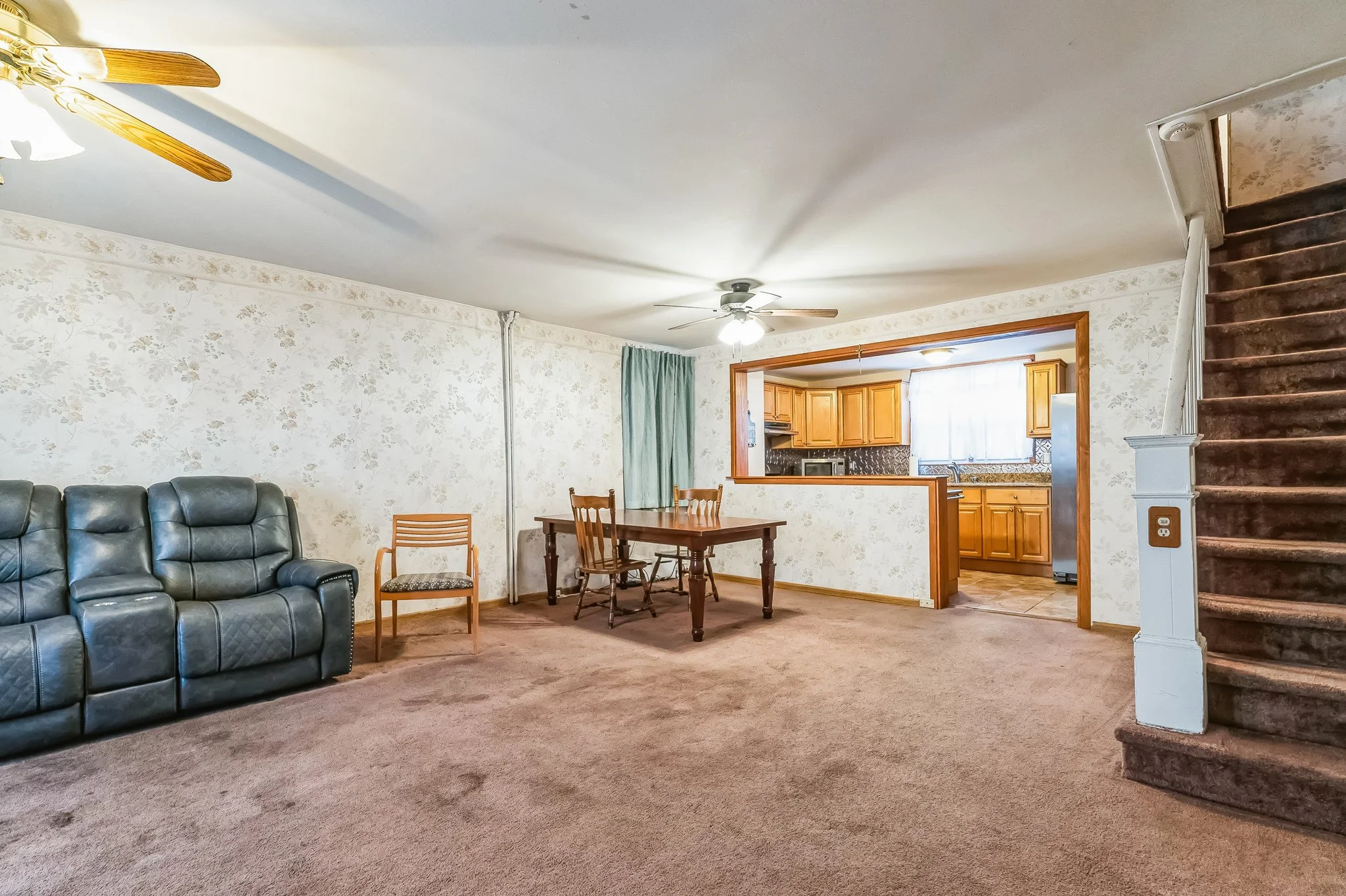 Calling all project lovers. Want an extra wide home that comes with a THREE car garage? This one's for you! The home is ready for a full renovation. Take your time and tackle project by project or go full blown before you move in! The garage space co