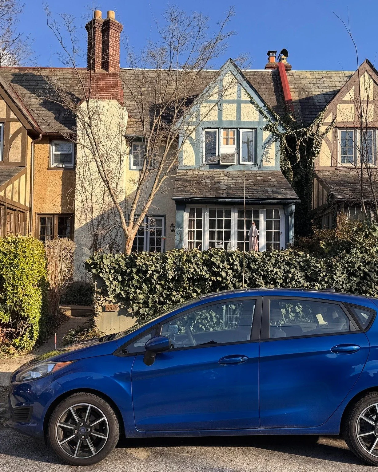 ✨ COMING SOON ✨Just a little peek at this West Mt Airy Tudor while we wait for the real pics! In the summer your fully blooming garden will welcome you home. It is a fully fenced in stone patio so the pups can easily play in the sunshine. The mature 