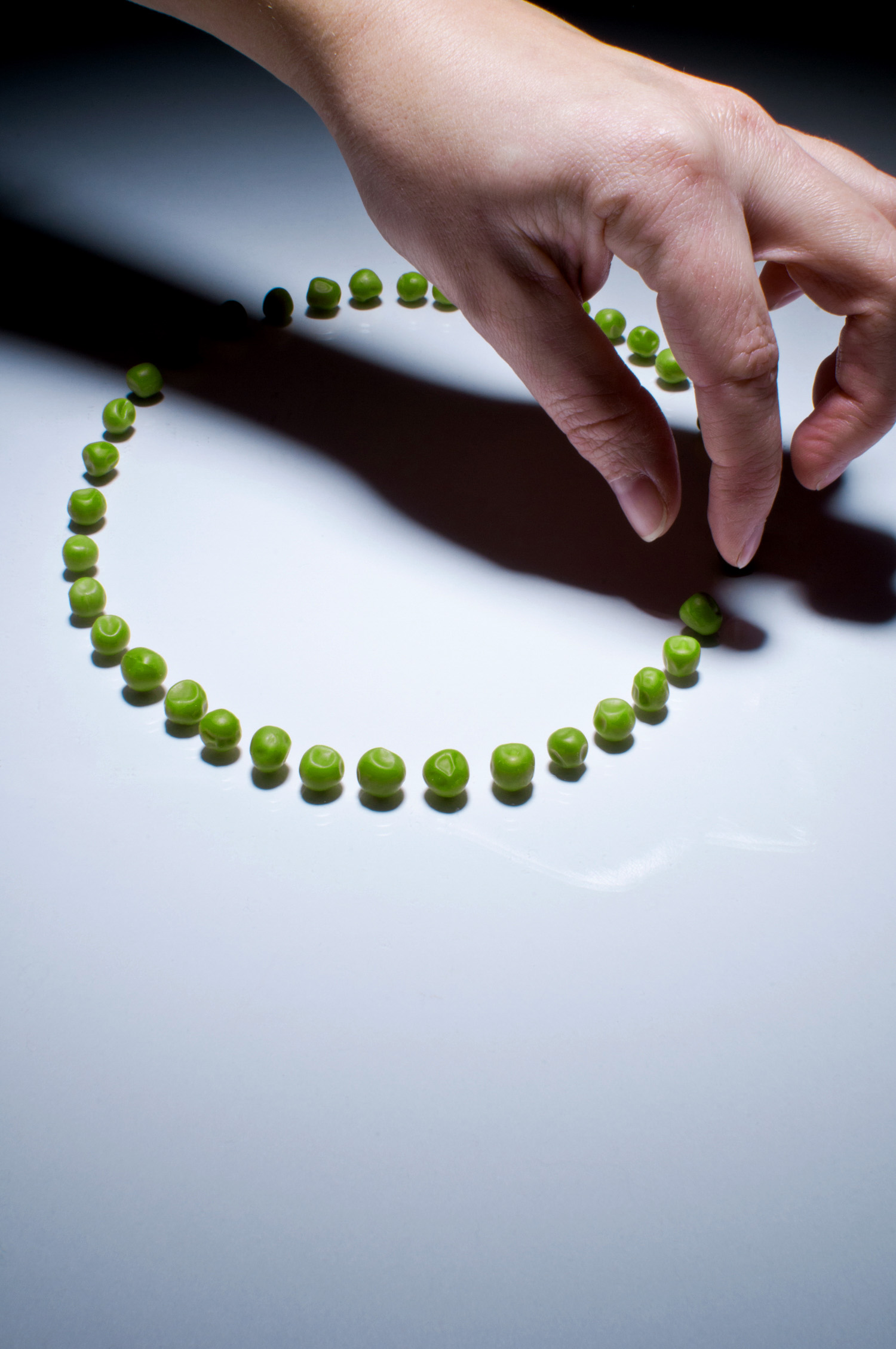 Hand and Peas