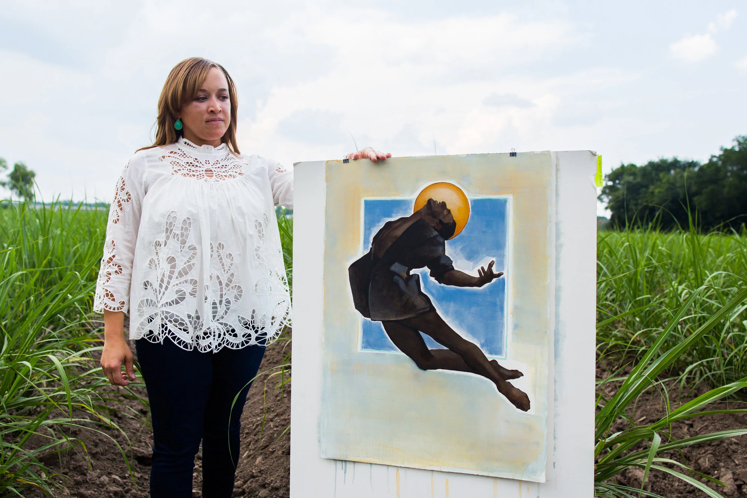 Angie pictured with some of her figurative work.