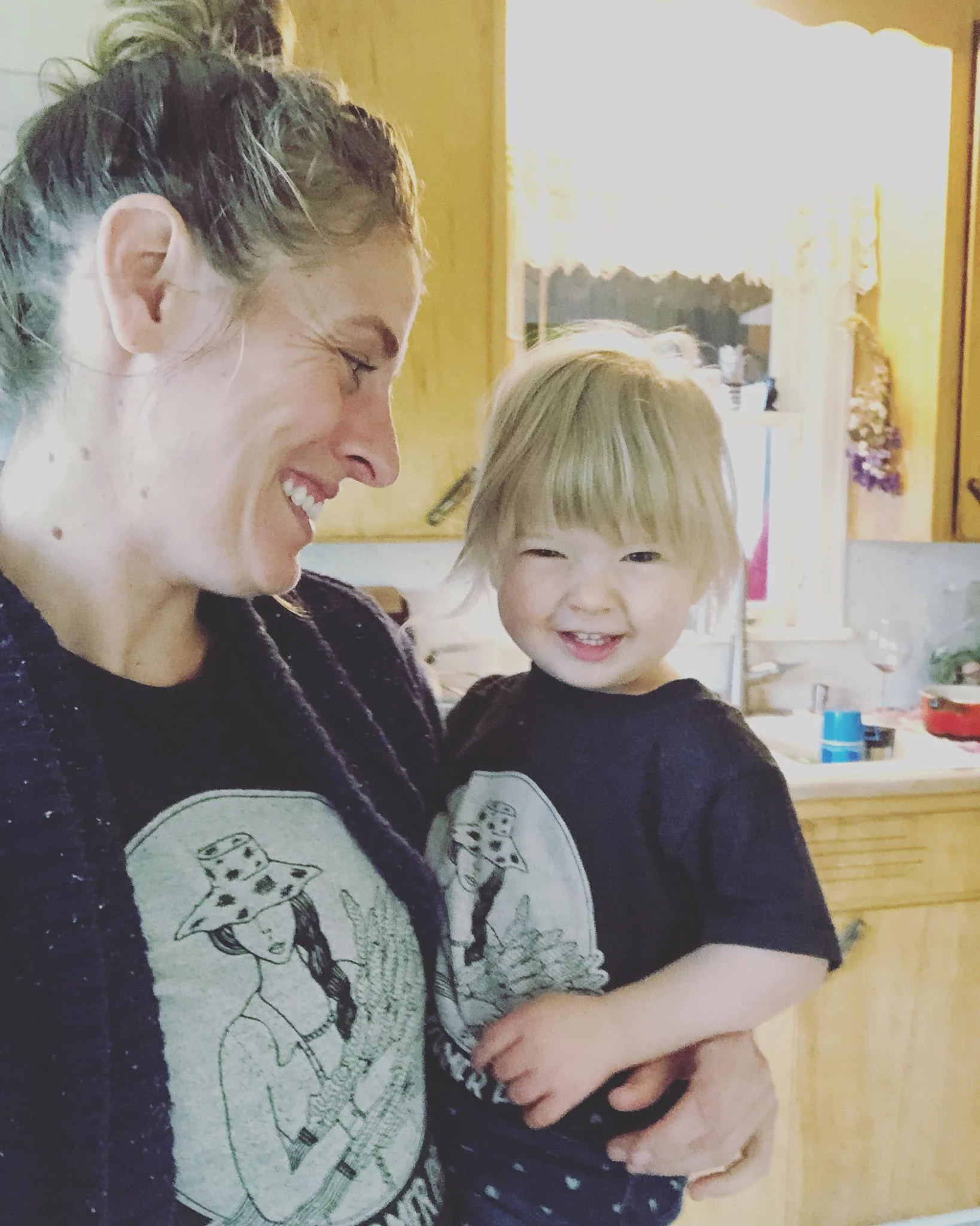 Micha and her daughter in Hers and Hers FFP Podcast Tees!