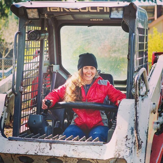 Jo volunteers on a local farmstead.