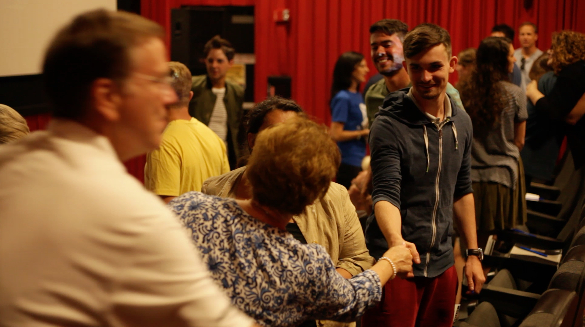 Volunteers from Greater Gresham welcoming one of the 123 guests at our summer preview services.