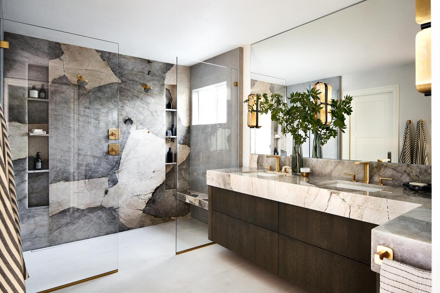 Q: How did the shower inform the rest of the design? Was the goal to complement rather than compete? - @anh_minh 
A: The shower was always intended to be the jewel of the space-calming yet bold focal point. Everything else was curated to support that