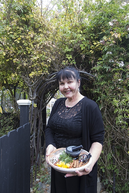 WITCHY WOMAN Power, spirituality, feminism—life and death: all of these grand dealings can be coaxed out of the many herbs catalogued at Kathryn Clayton’s Cambria shop, Spellbound. PHOTO BY JAYSON MELLOM