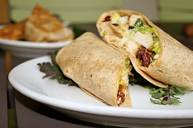 HAIL CAESAR! Full of crunchy lettuce and tender chicken, this Caesar wrap is a fresh choice for a quick lunch bite.