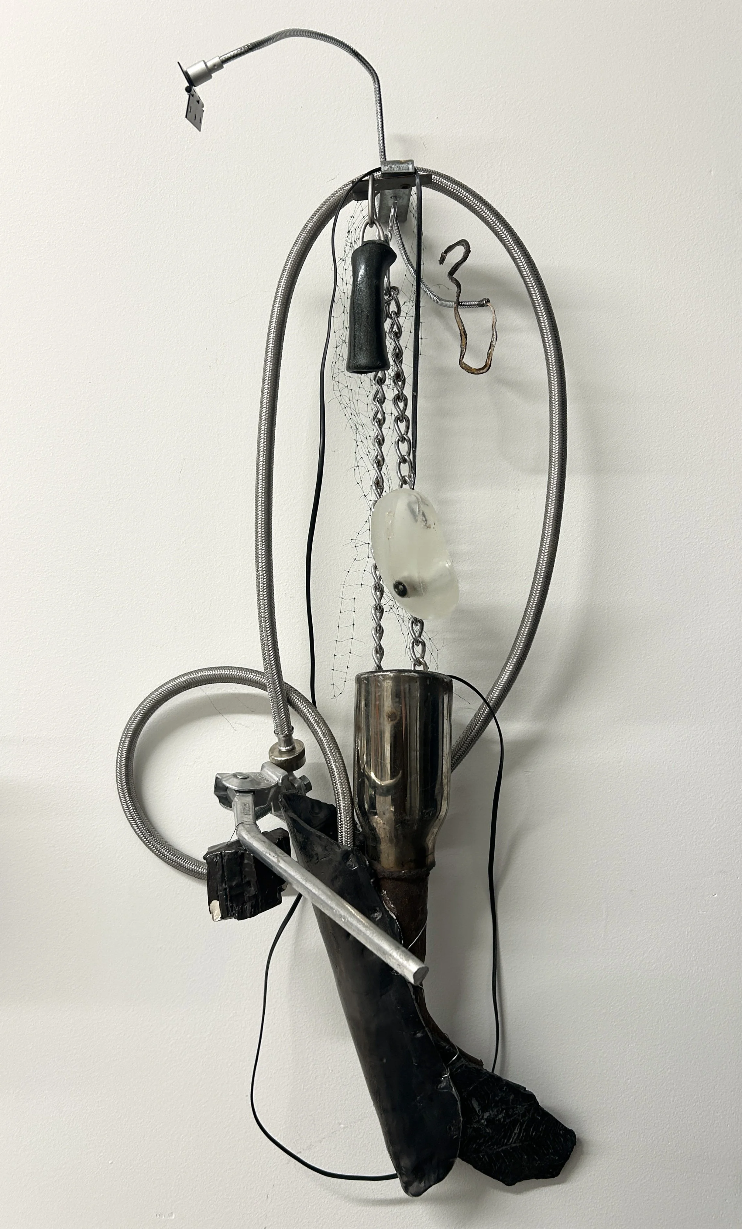 Tail Pipe, cast resin, telecommunication cord, cement, tail pipe, snake, ceramic, kickstand, fossil, hardware, aluminum wire and tubing 