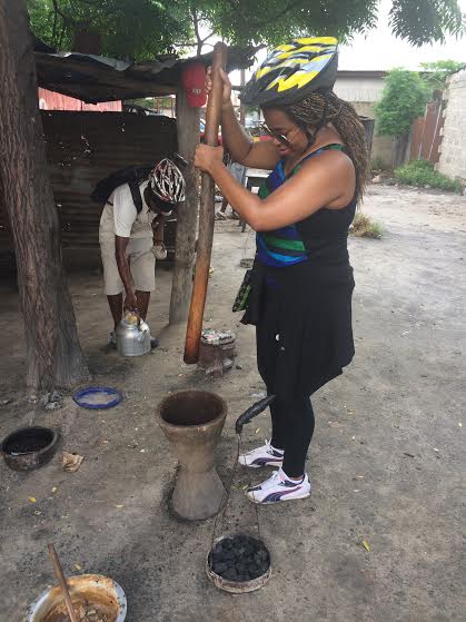 Me grinding coffee like a typical Tanzanian woman. Ha!
