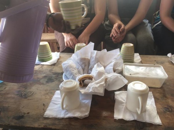 Tea and chapati being served