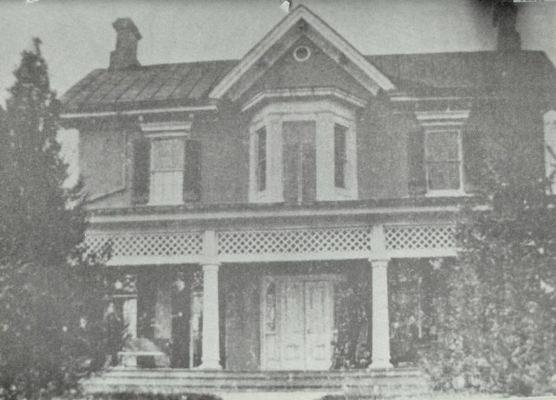 Front of Cedar Hill in the 1890's with Frederick Douglass visible in the shadows to the right of the door. Photo Credit: National Park Service