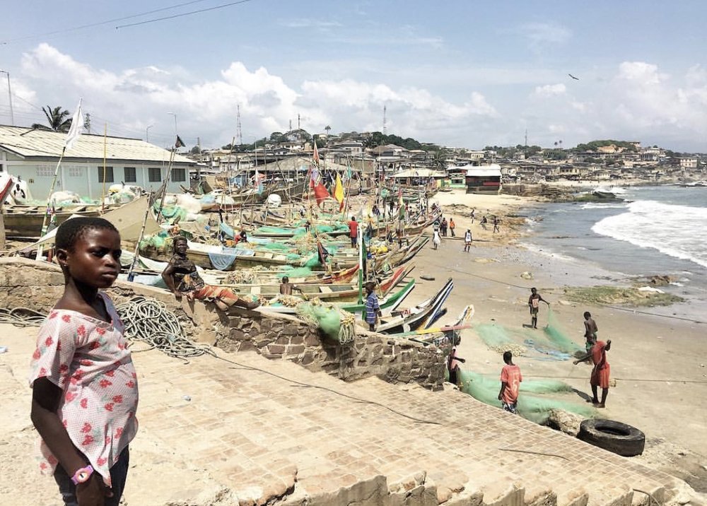 Outside the Door of No Return, where Ghanaians are living and working.