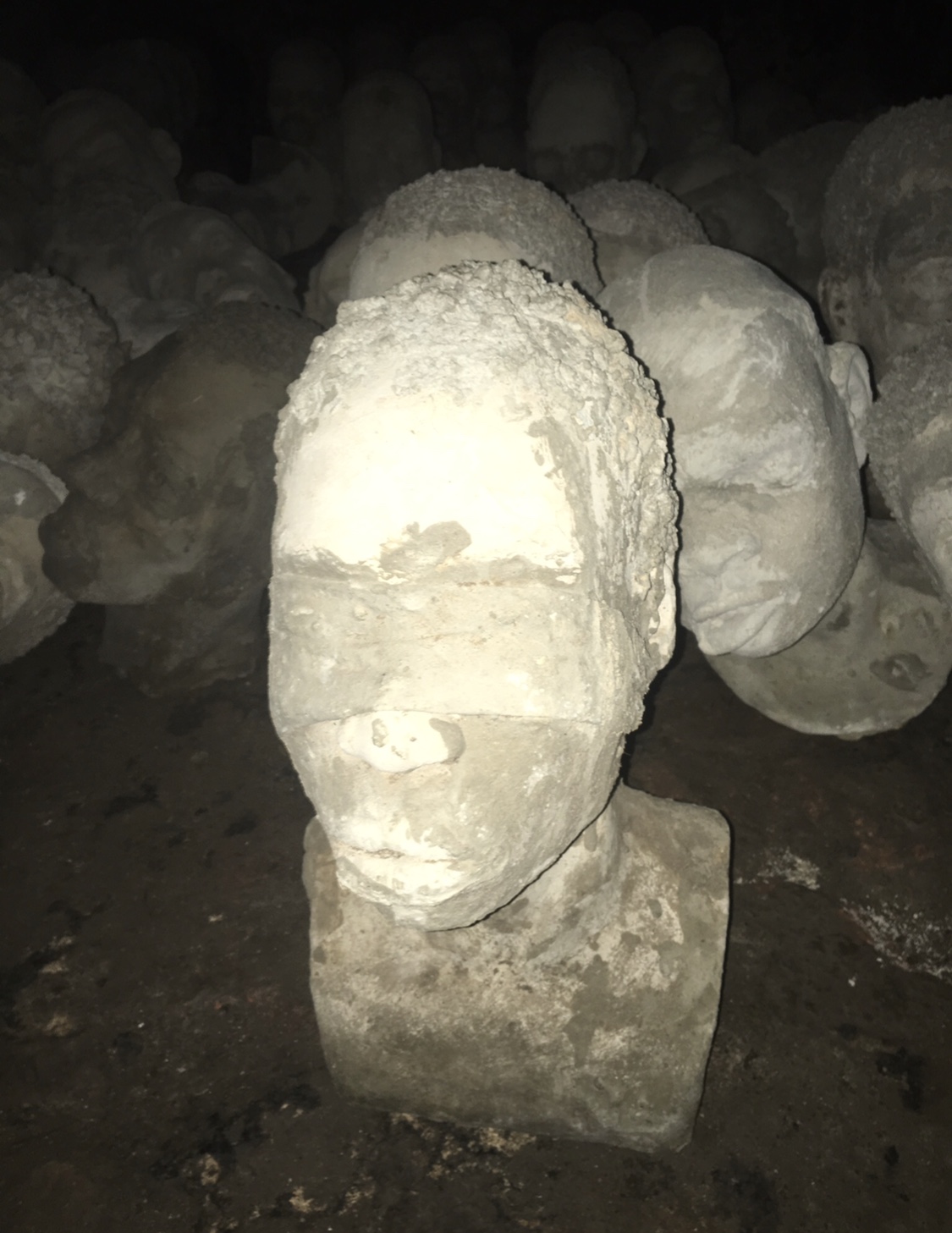  In the dungeons, 1,300 concrete heads are on display that depict some of the lives that were transplanted. Each is different and show the possible faces of Africans slaved at Cape Coast Castle. 