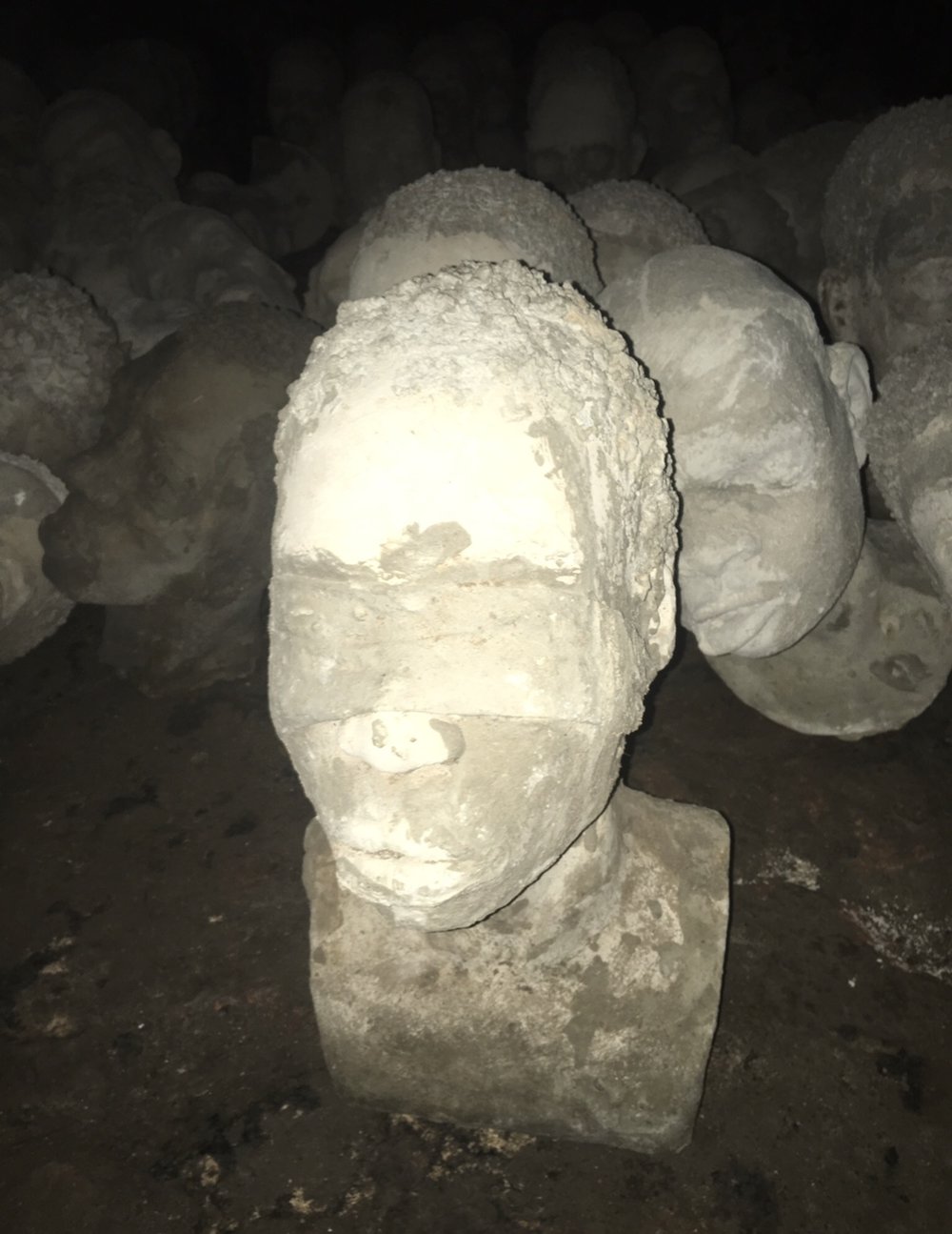 In the dungeons, 1,300 concrete heads are on display that depict some of the lives that were transplanted. Each is different and show the possible faces of Africans slaved at Cape Coast Castle.