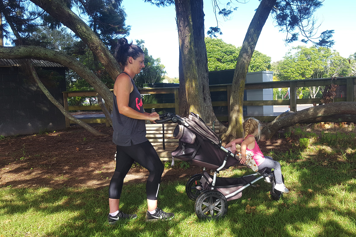 Safe technique with bent arms and body close to buggy.