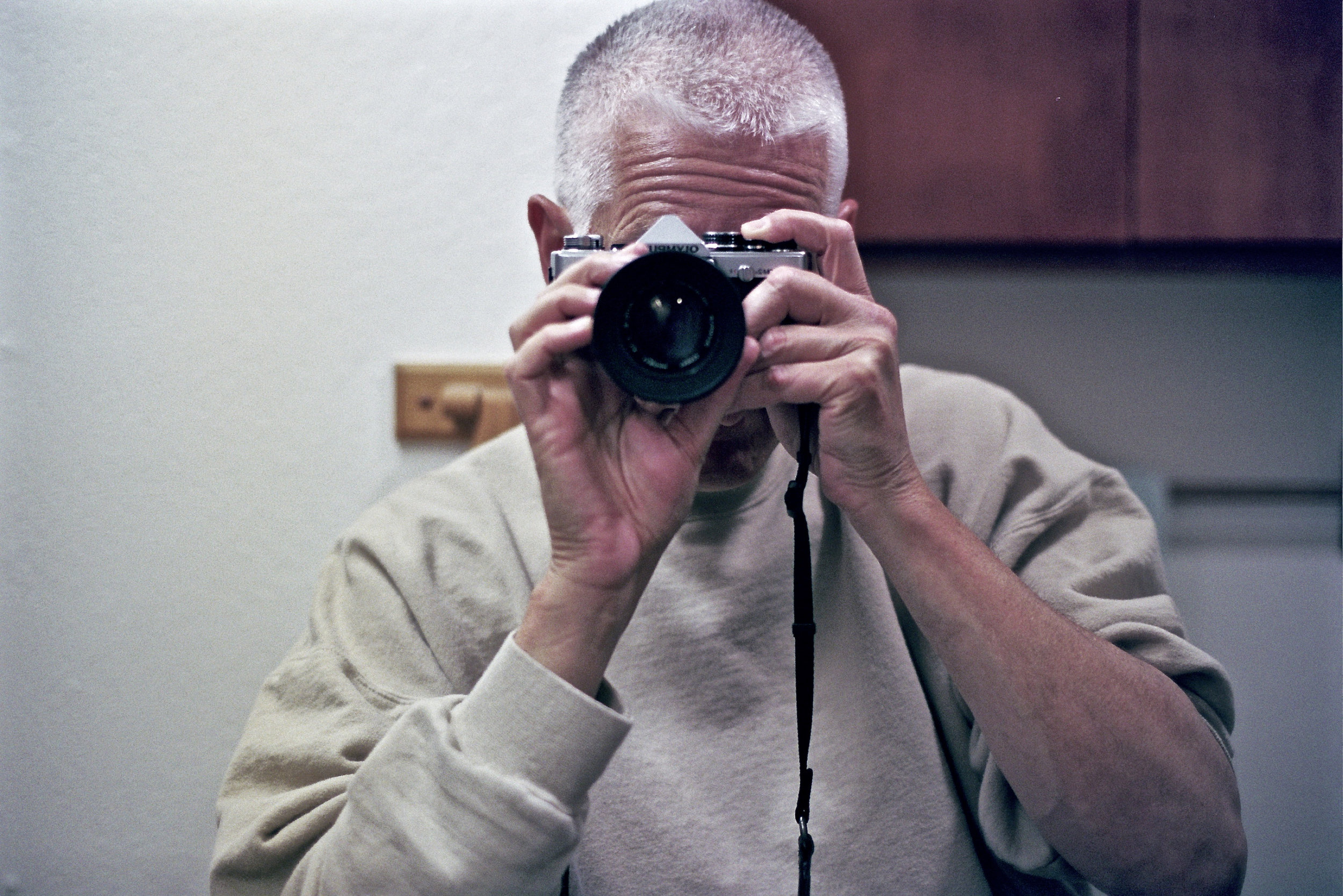 Me with the OM2n on expired Portra 400