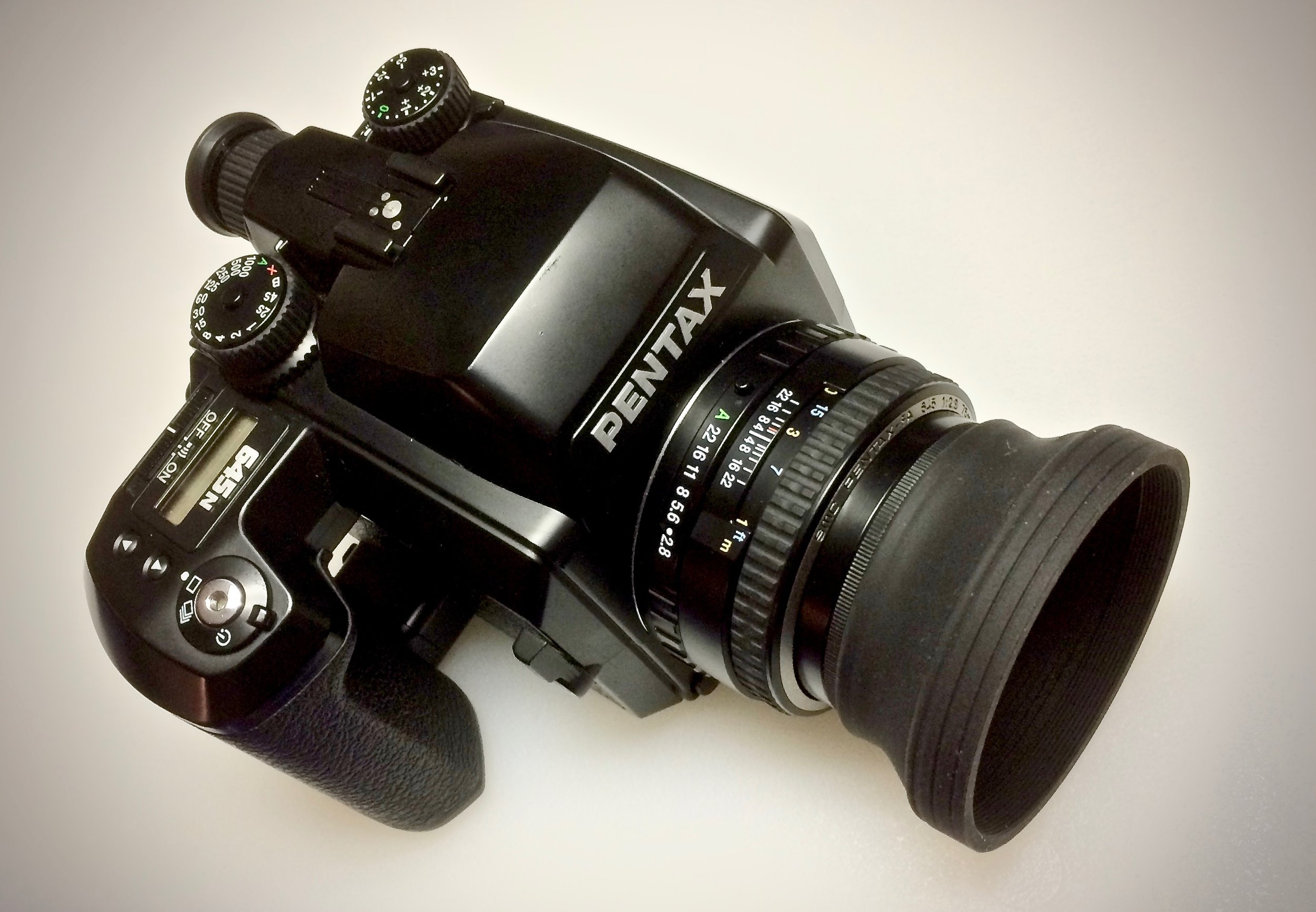 Pentax 645n with Pentax SMC FA 75mm f/2.8 and collapsable lens hood