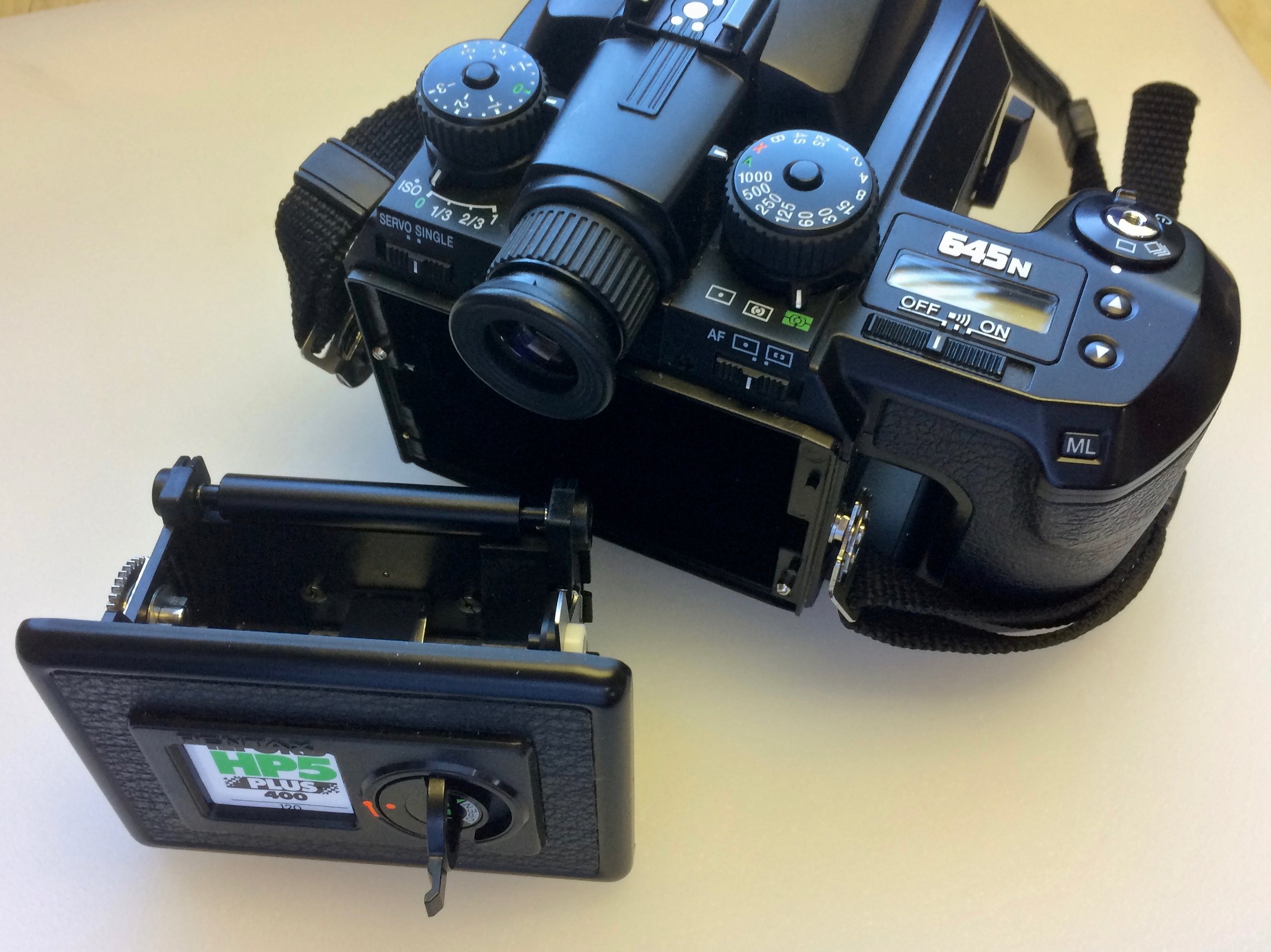 The Pentax 645n uses removable film inserts