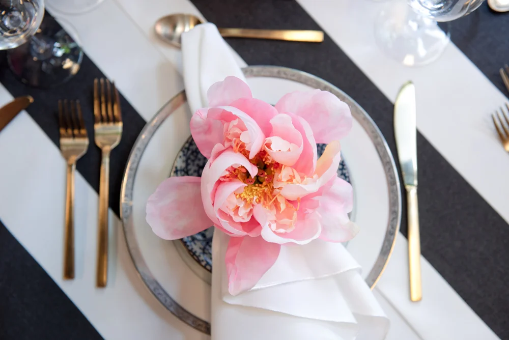 We turned beautiful blooms into napkin rings to make each place setting lovely and unique.