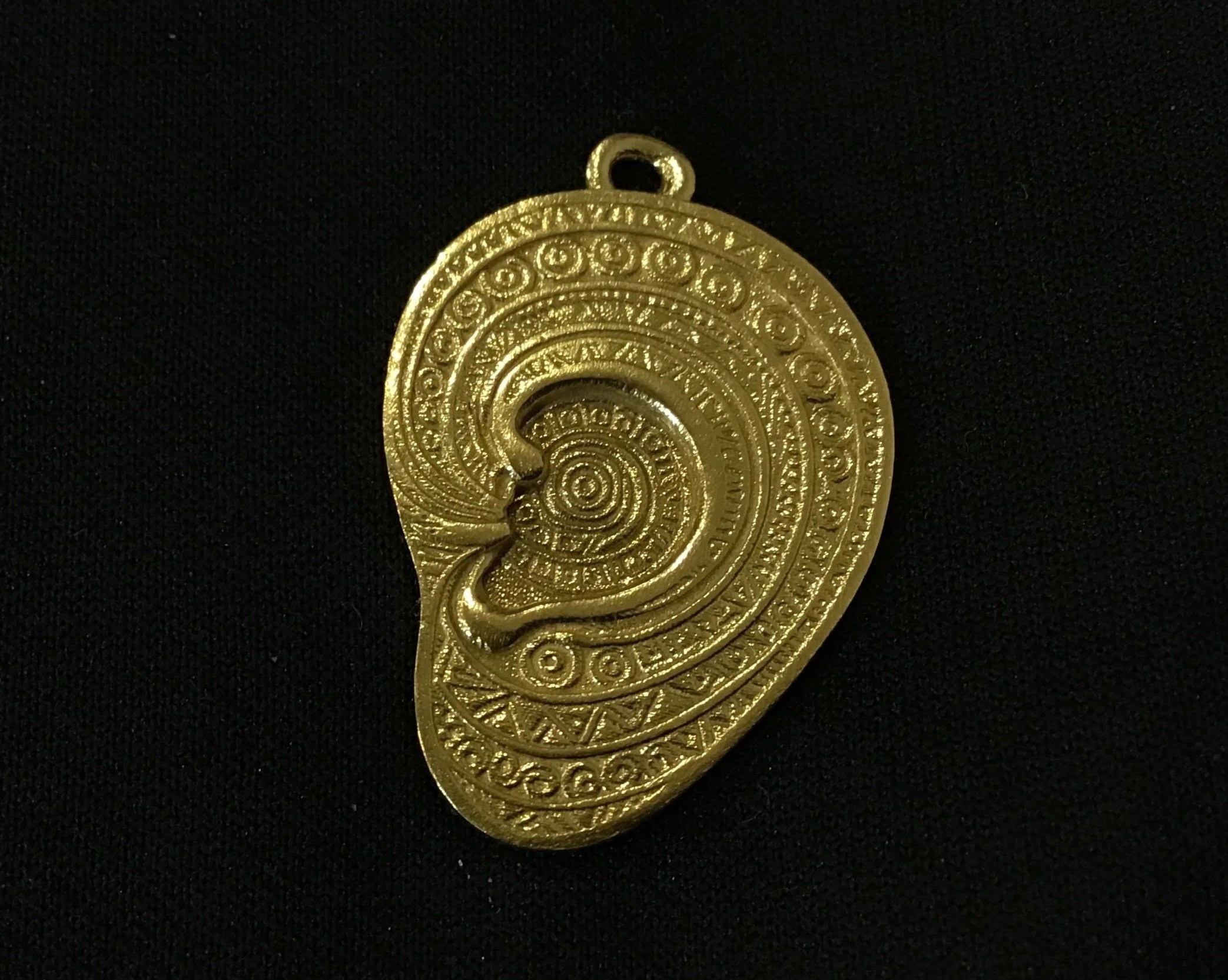 Obadike ear amulet bronze.jpg