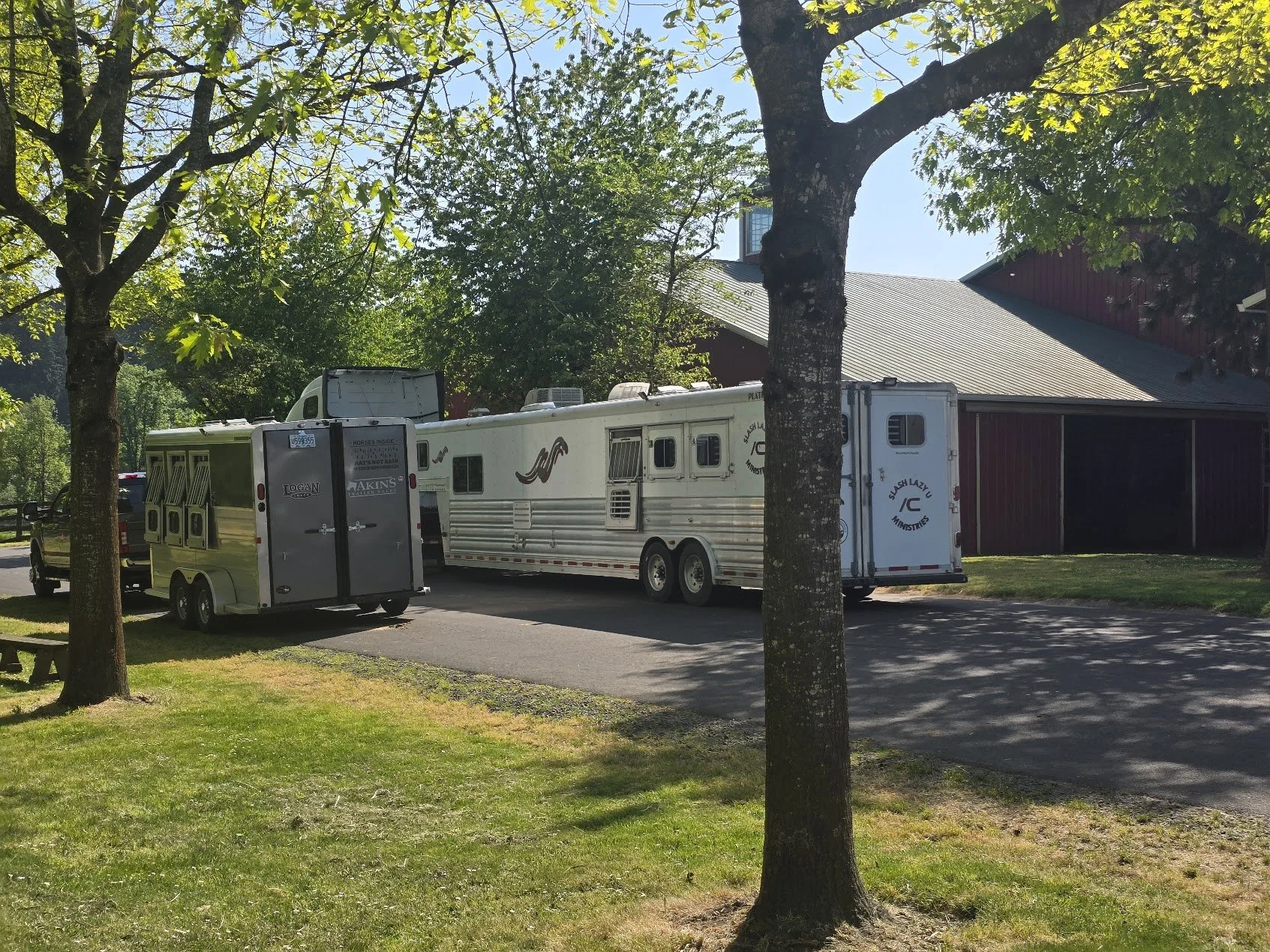 trailers in front of barn.jpg