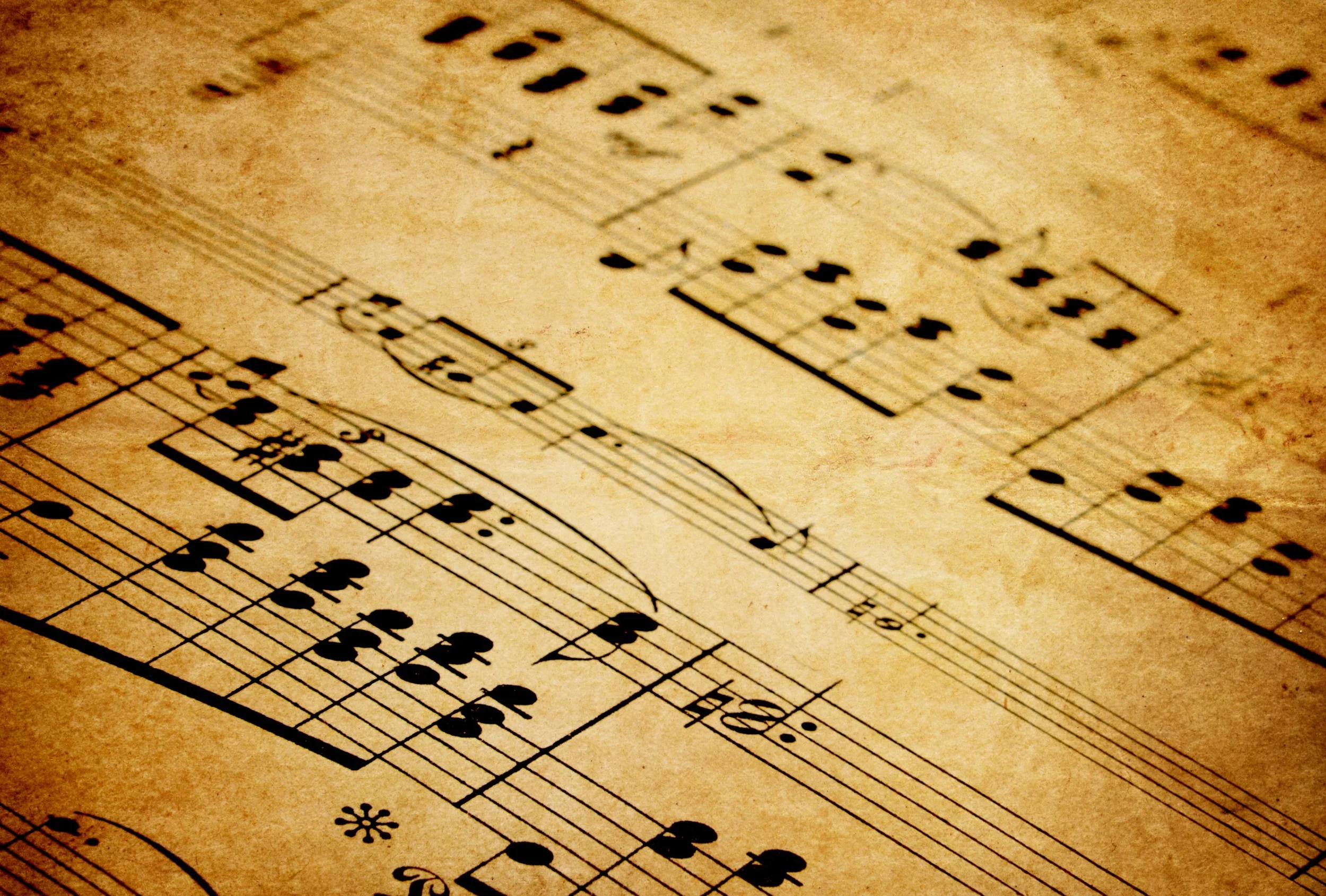 Notes and Neurons: Music - A language or "auditory cheesecake"?