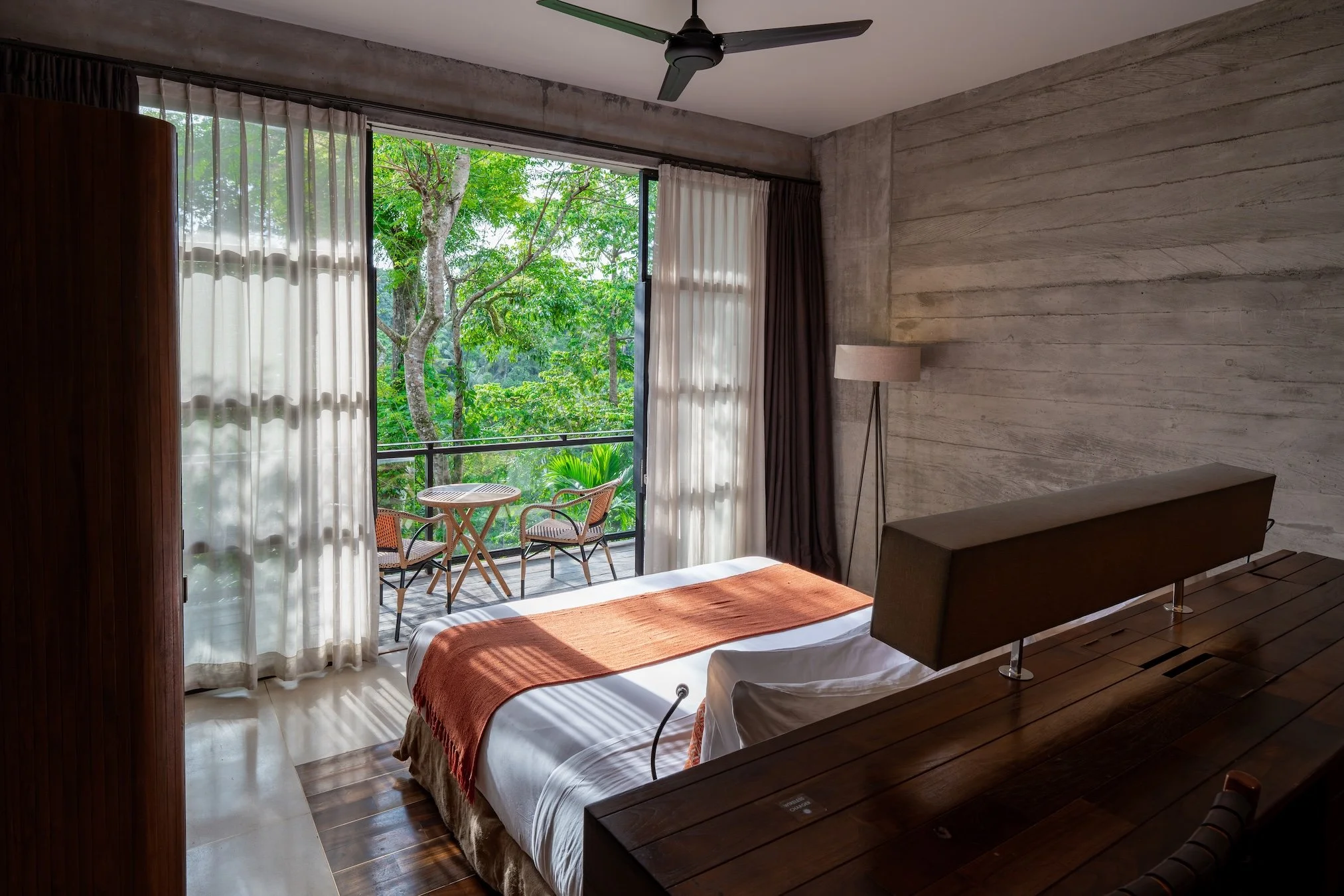 a hotel suite in ubud overlooking lush ubud forest