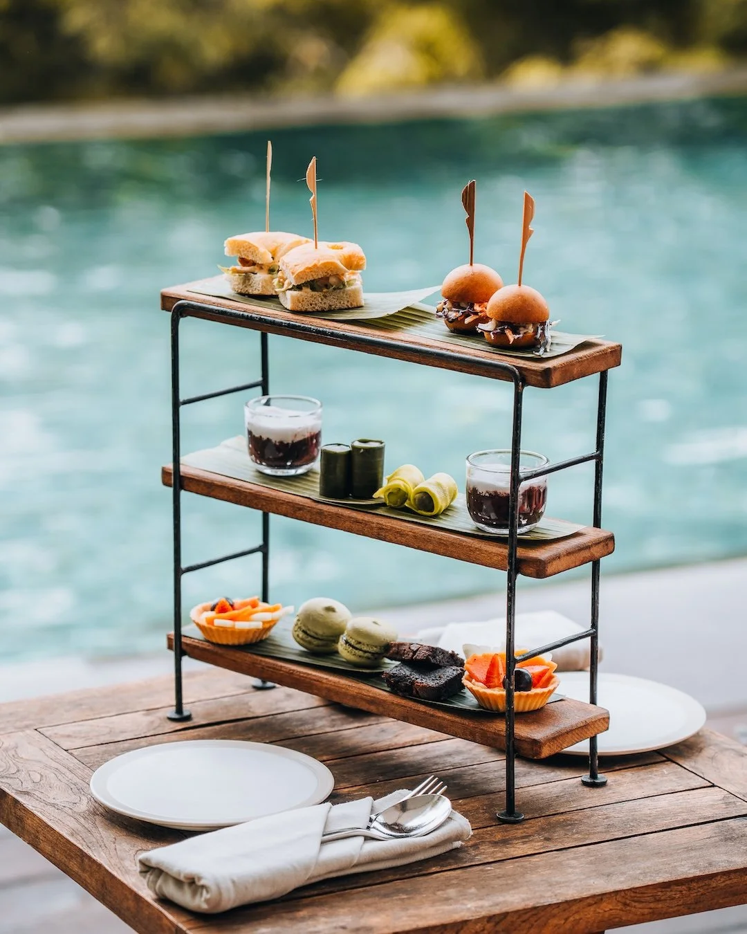 bisma eight ubud afternoon tea by the pool
