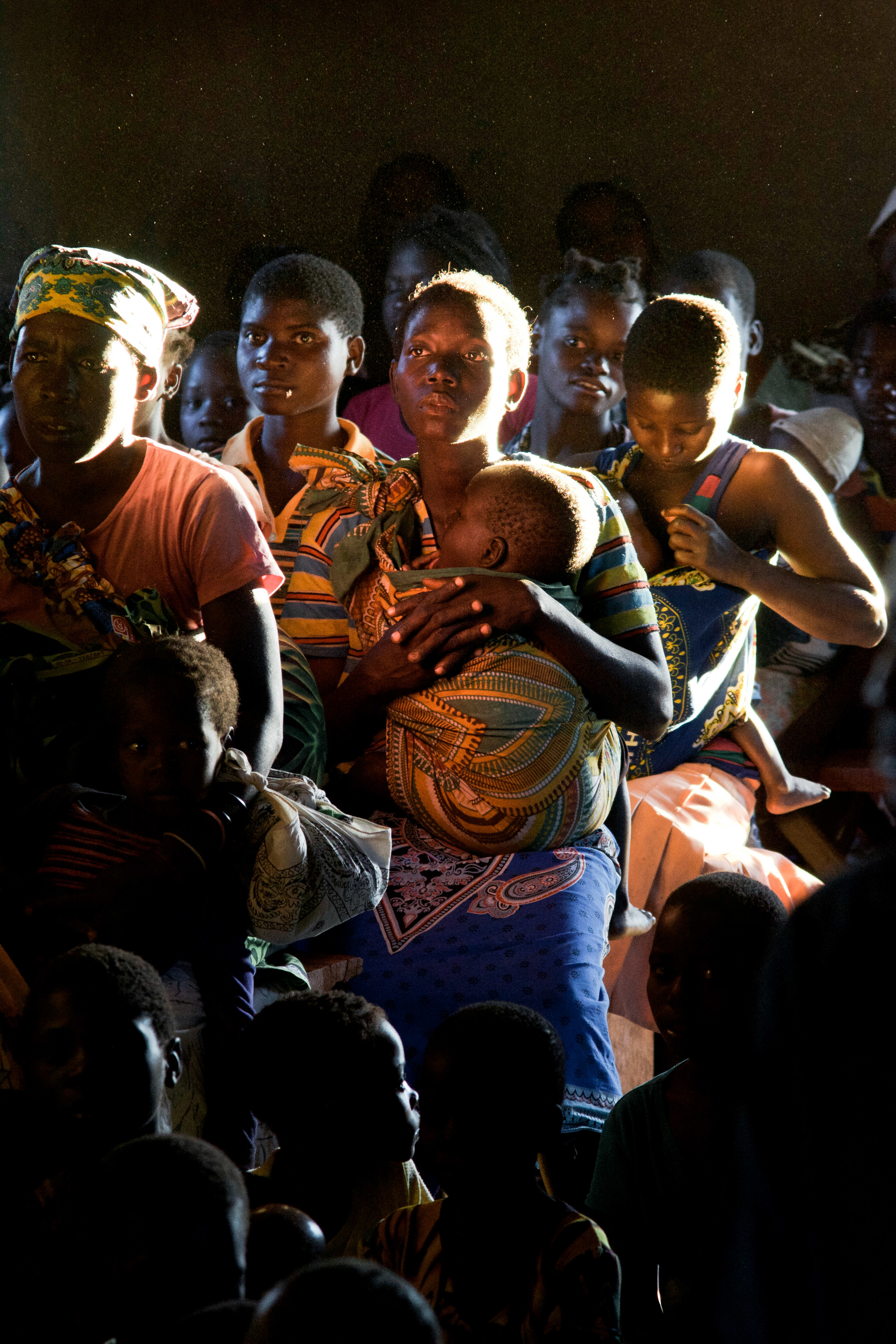 We visited this church in 3 de Fevereiro late in the afternoon and the light was nothing like I've ever seen. Here, mothers and their babies are illuminated as they listen to a message being given.