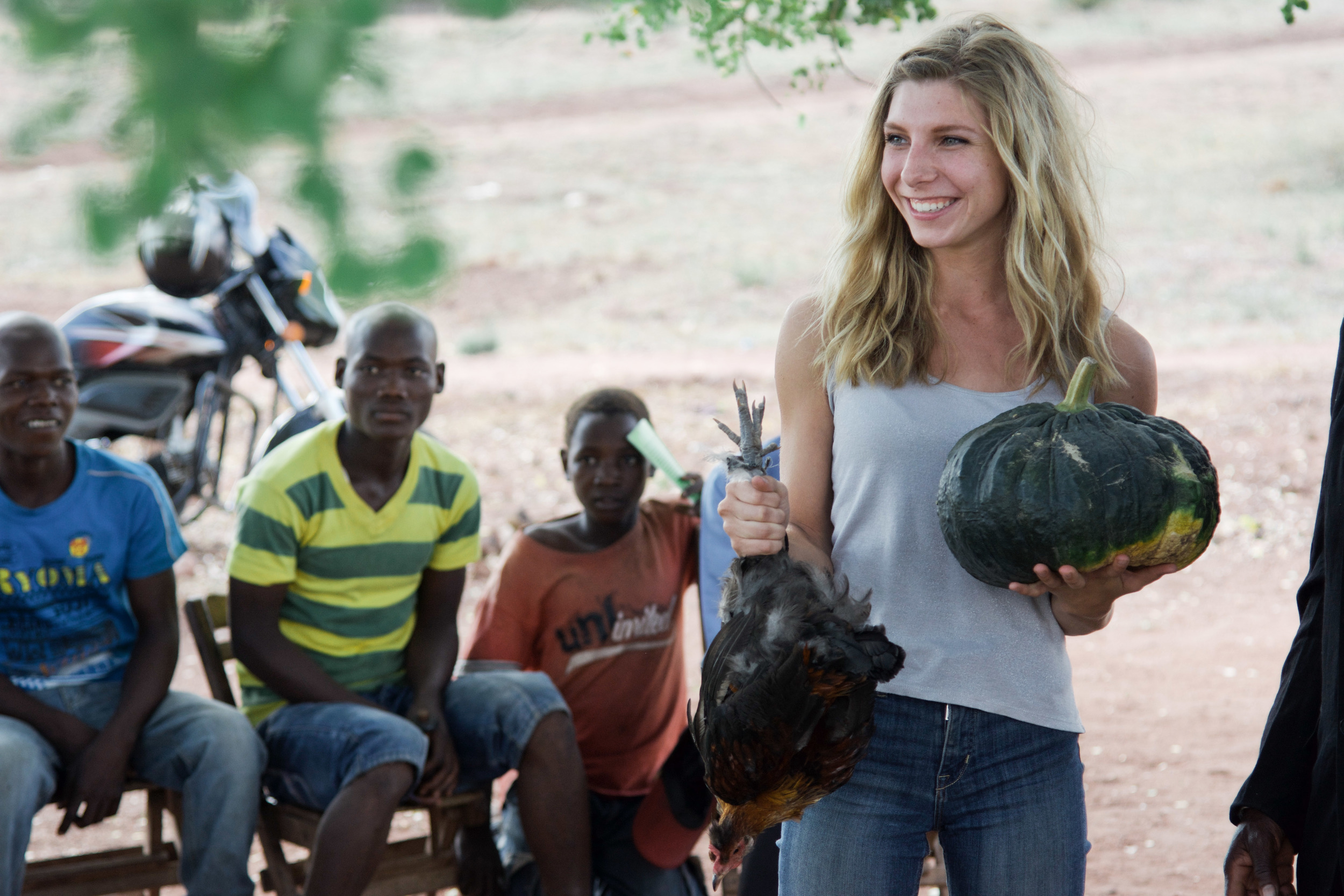 Yours truly receiving a chicken and a squash from the congregation in Muanda, Mozambique.