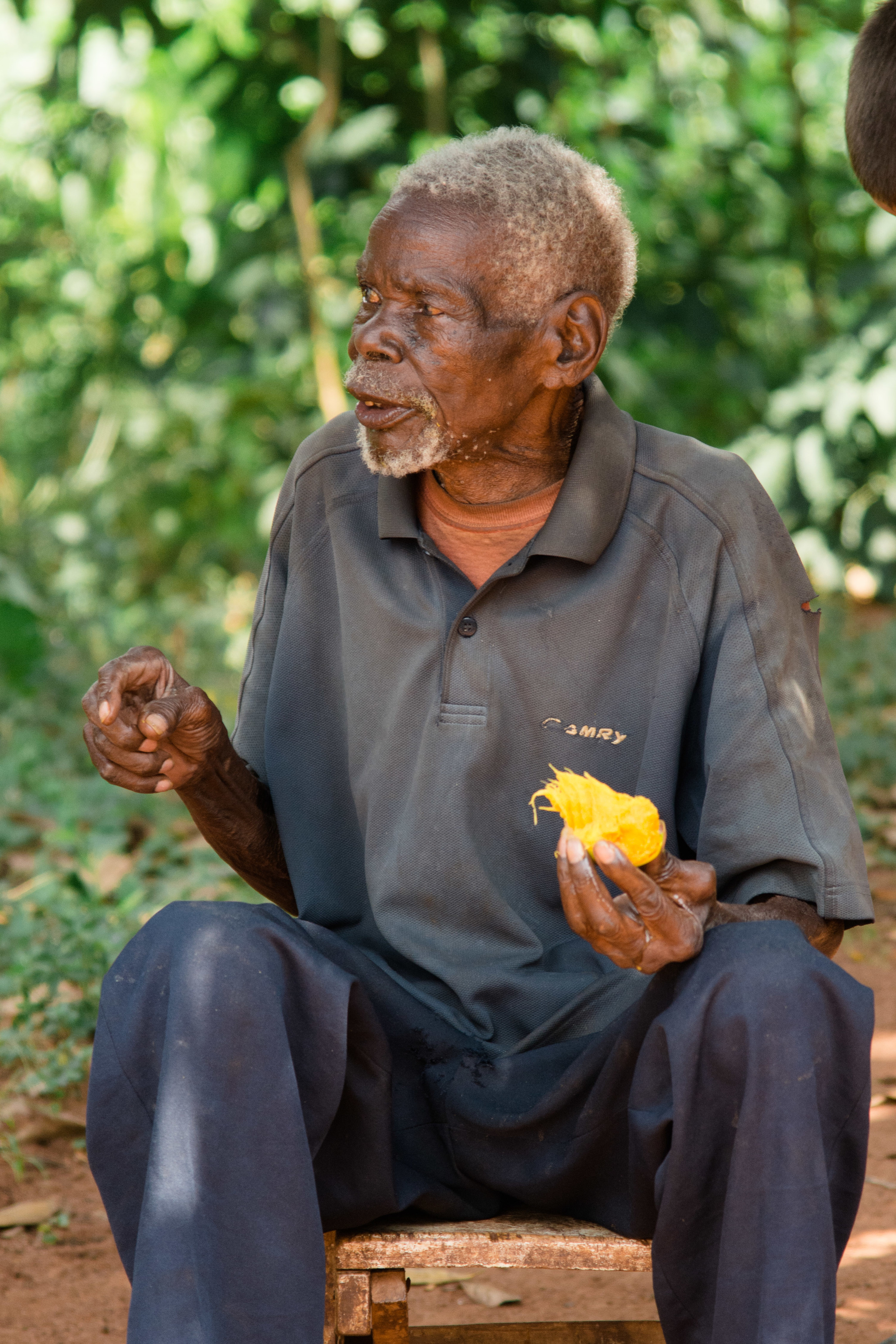Eating a mango on a hot afternoon