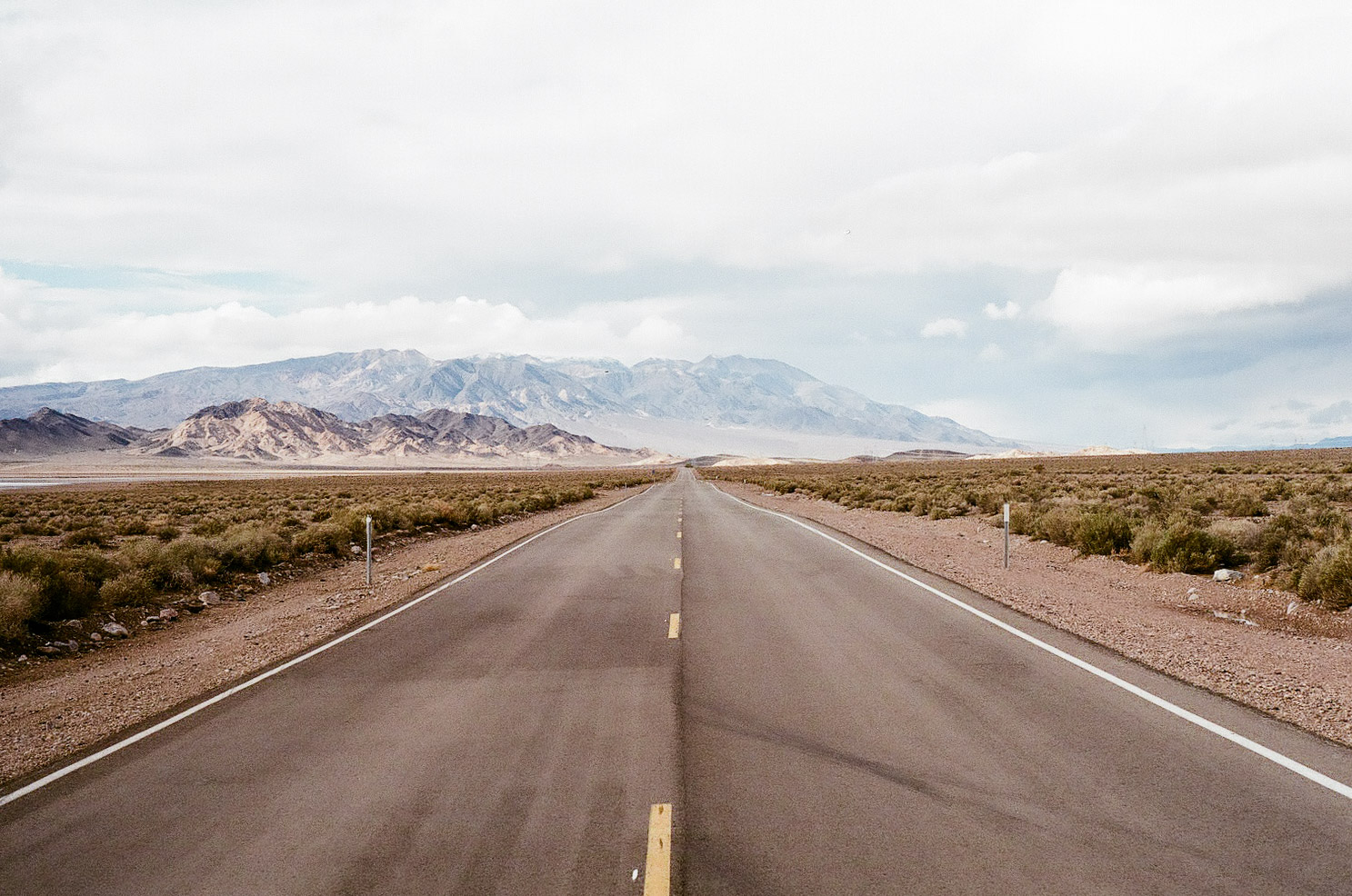 Coming into Death Valley, the land is harsh and colored in a mostly monochromatic, earthen palette. It's hard to imagine what the desolate landscape would be like in oppressive, dangerous July heat.