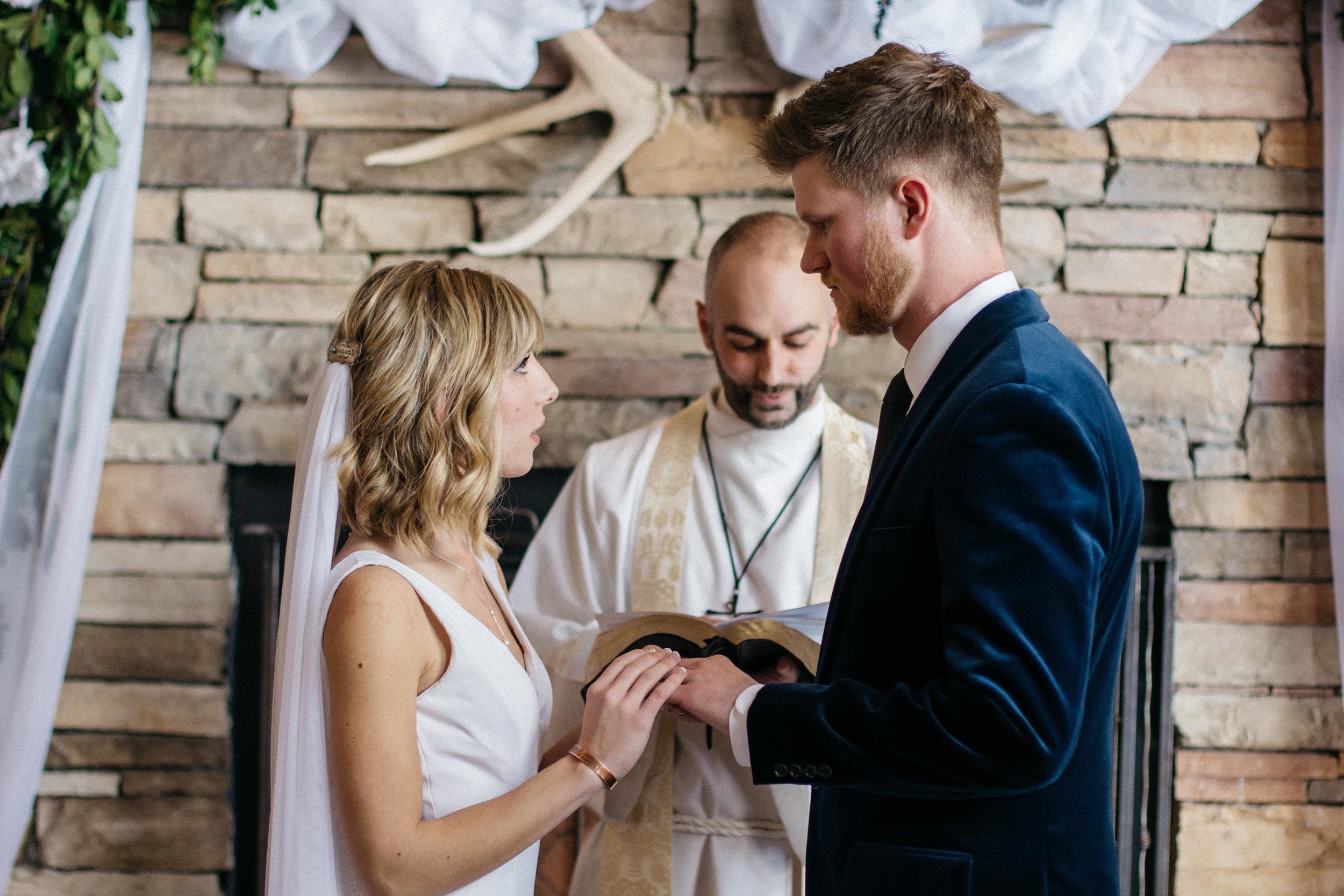 Saying our vows were some of the longest, most intense seconds of my life. We chose to rely on the liturgy rather than write our own vows, and in the moment I was so glad--I didn't know how couples could manage to say, let alone write, their vows without breaking down!