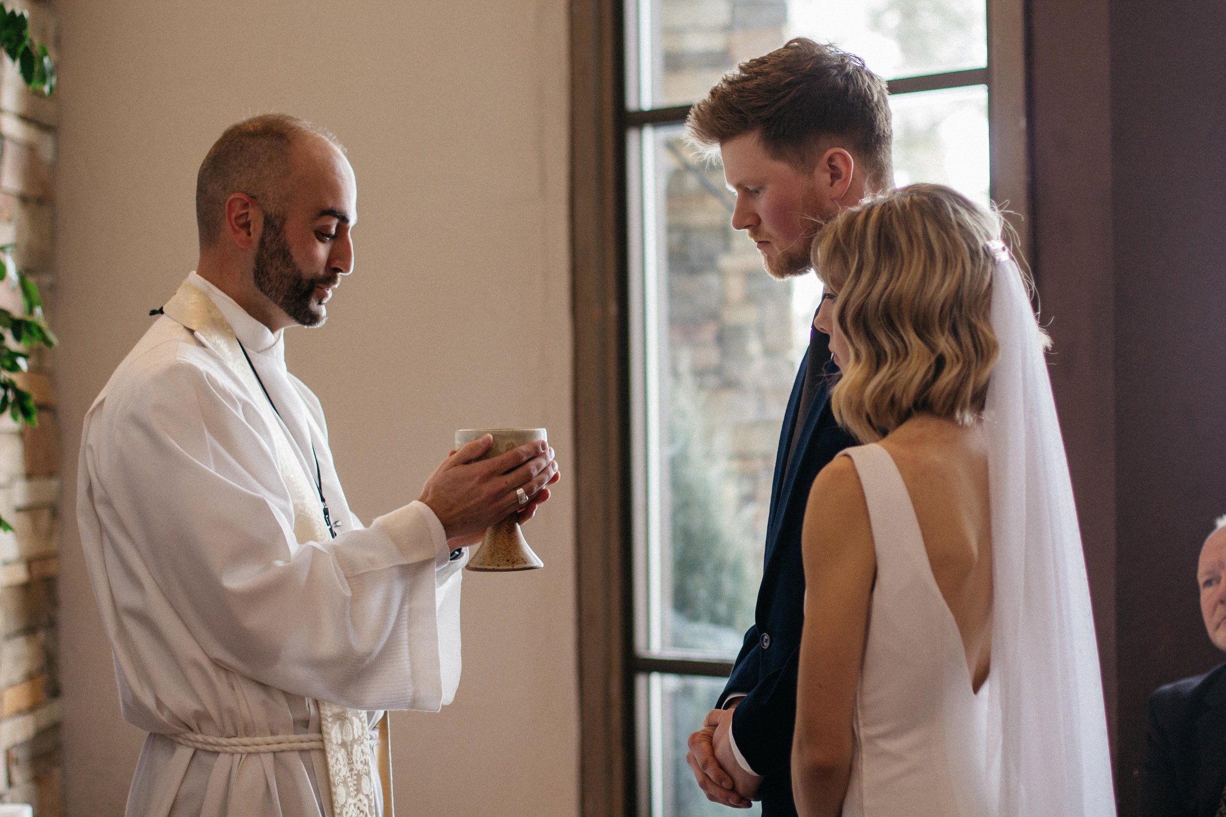 Towards the end of the ceremony, we had communion for the first time as husband and wife to the most beautiful song by Sufjan Stevens.