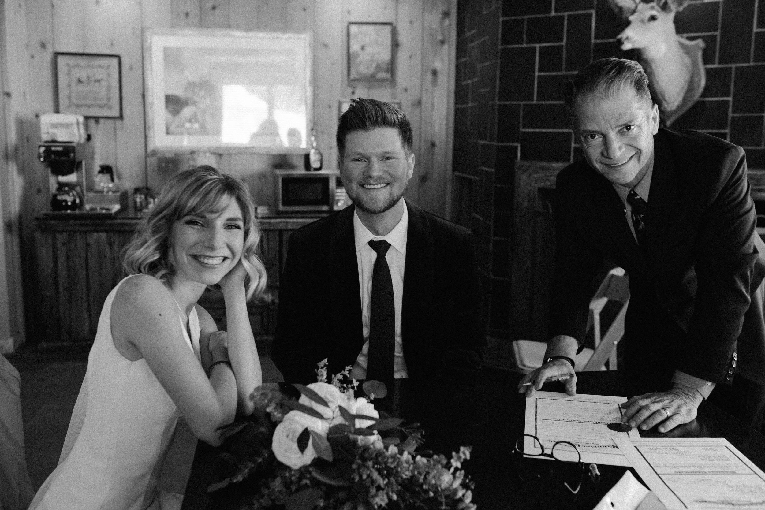 Signing the marriage license with my dad in newlywed bliss. 