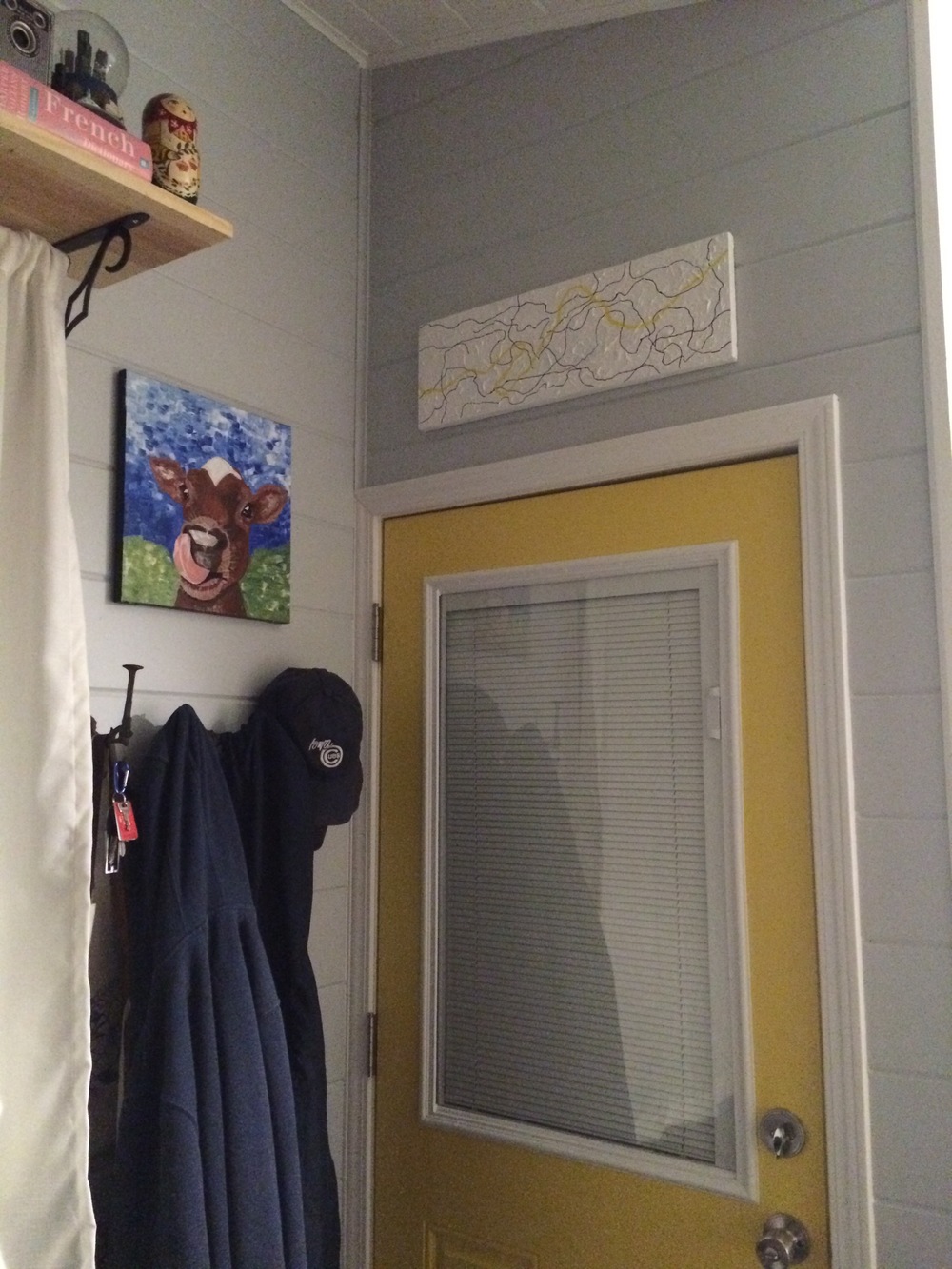  Our entryway. We have hooks for coats and hats and shoe storage that hangs on the wall beneath.&nbsp; 