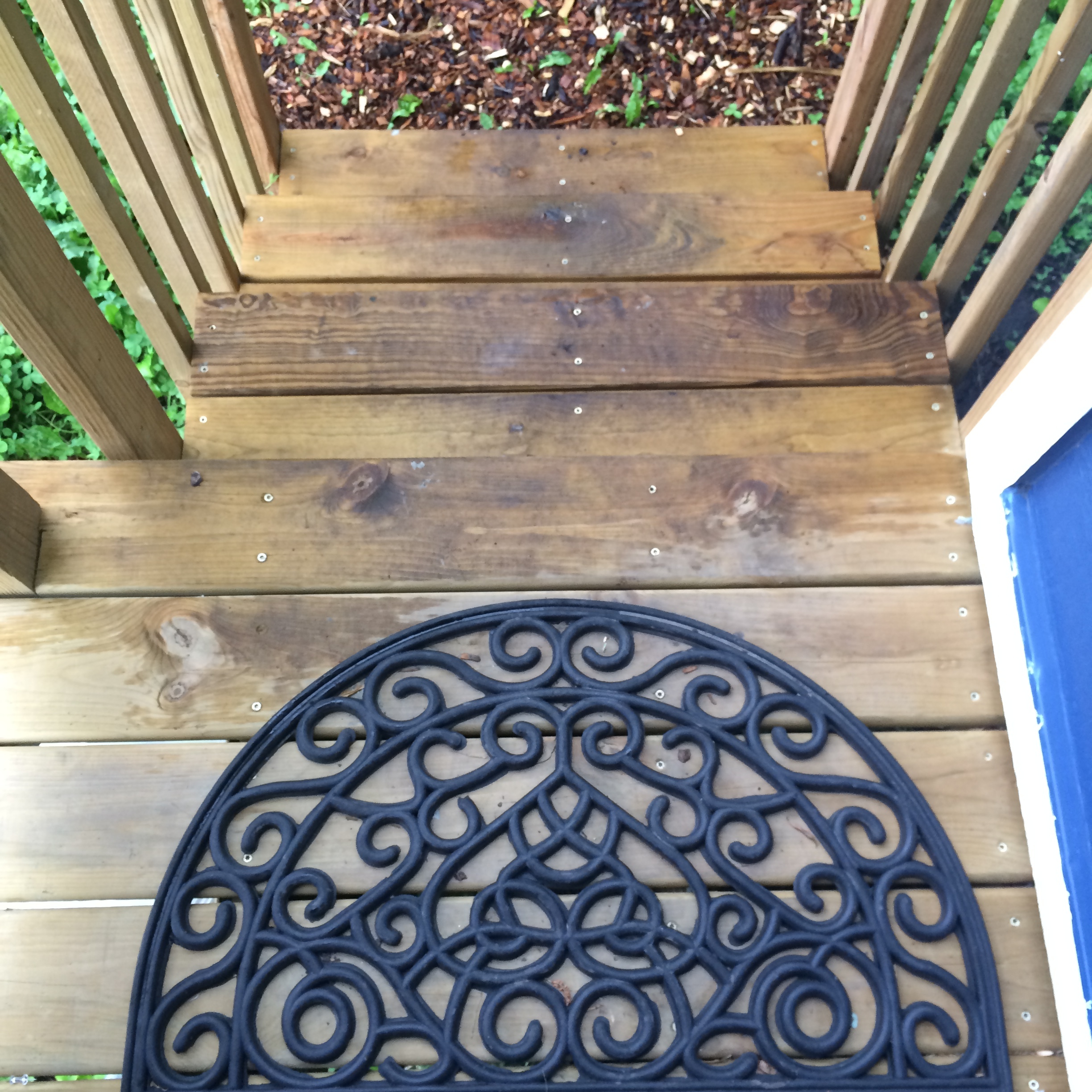  Our tiny front porch/stoop and our welcome mat. 