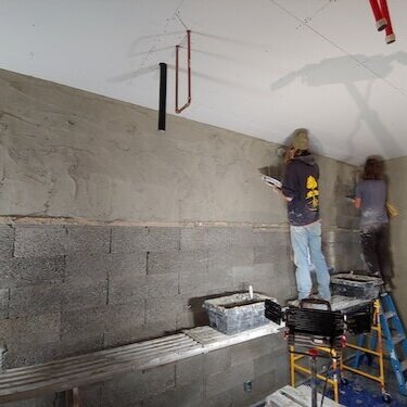 applying plaster to an ICF wall
