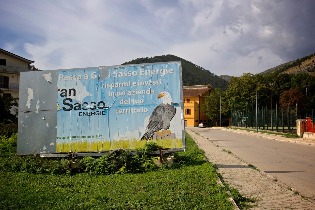  Pubblicità di aziende energetiche del territorio in pieno paese. Bussi sul Tirino (Pescara), 2014. 