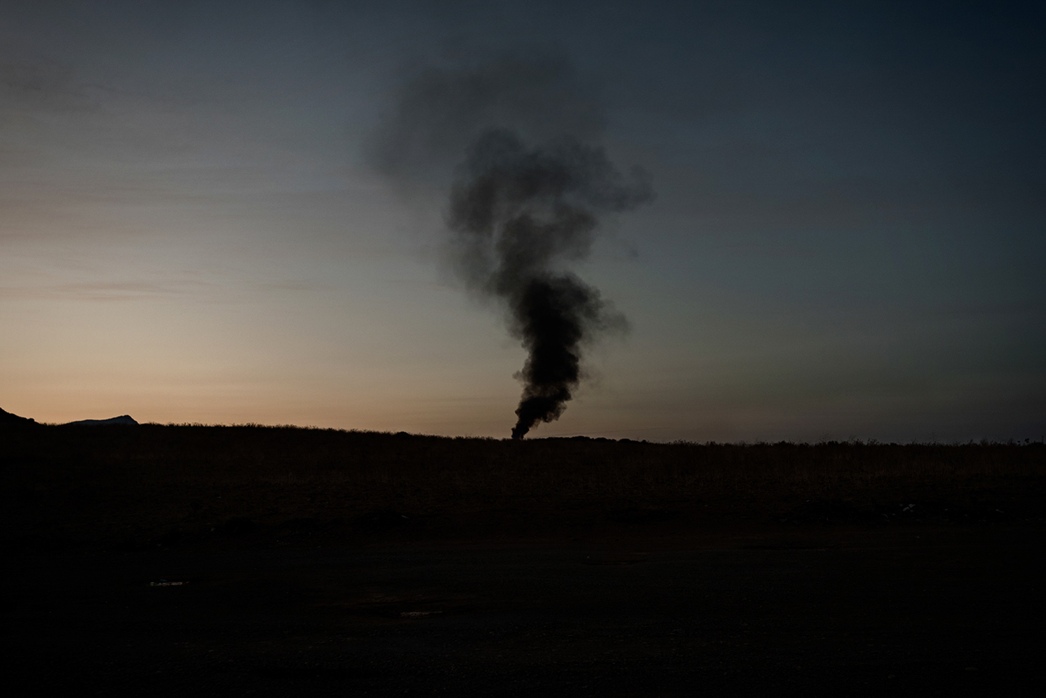  Coltre di fumo osservata a centinaia di metri di distanza. Sarroch (Cagliari), 2017. 