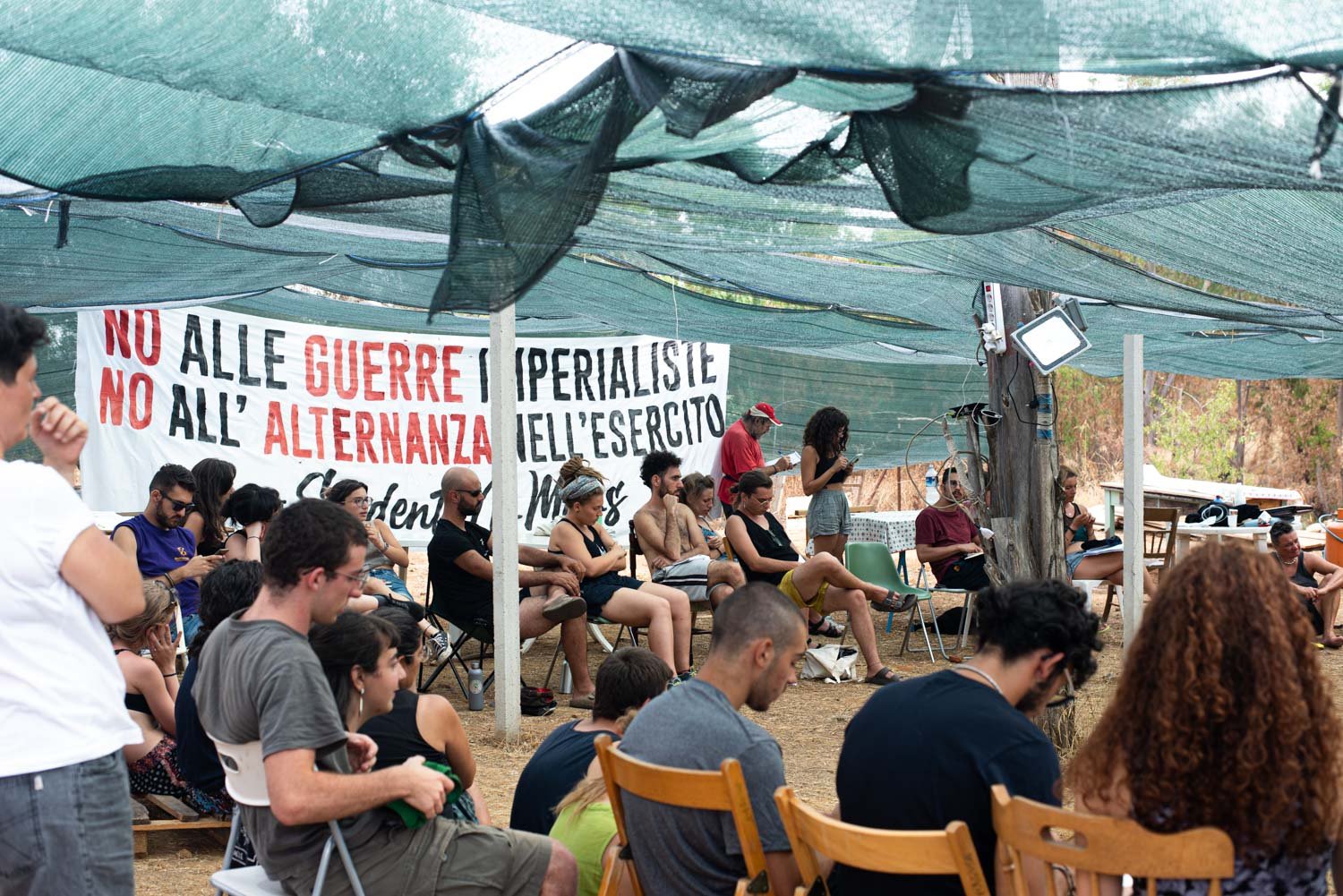  Interventi degli attivisti del presidio, tutti gli anni il Comitato NoMuos organizza un campeggio di protesta alla base. Niscemi (Caltanissetta), agosto 2022. 