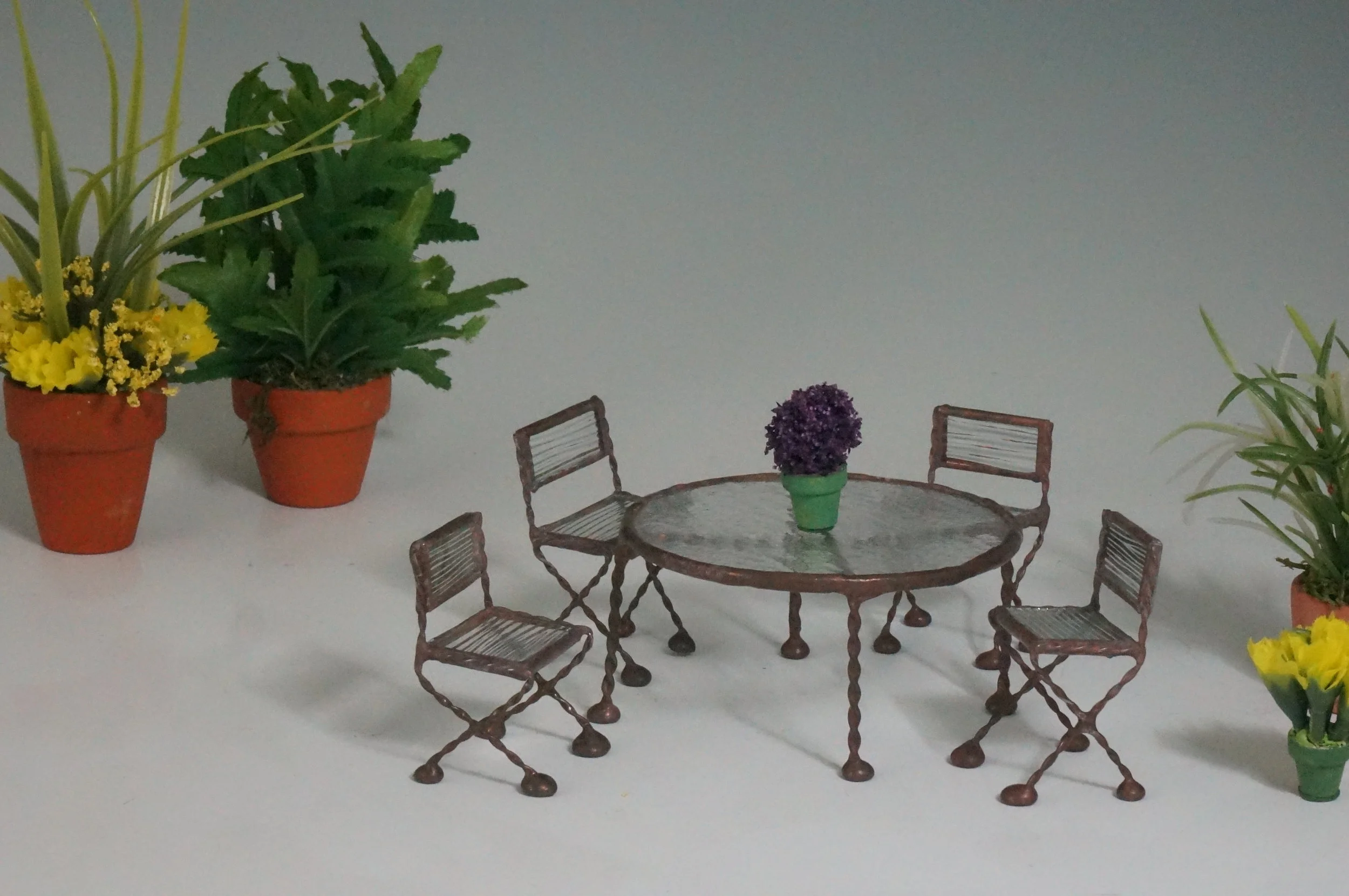 Cafe table and four chairs.JPG