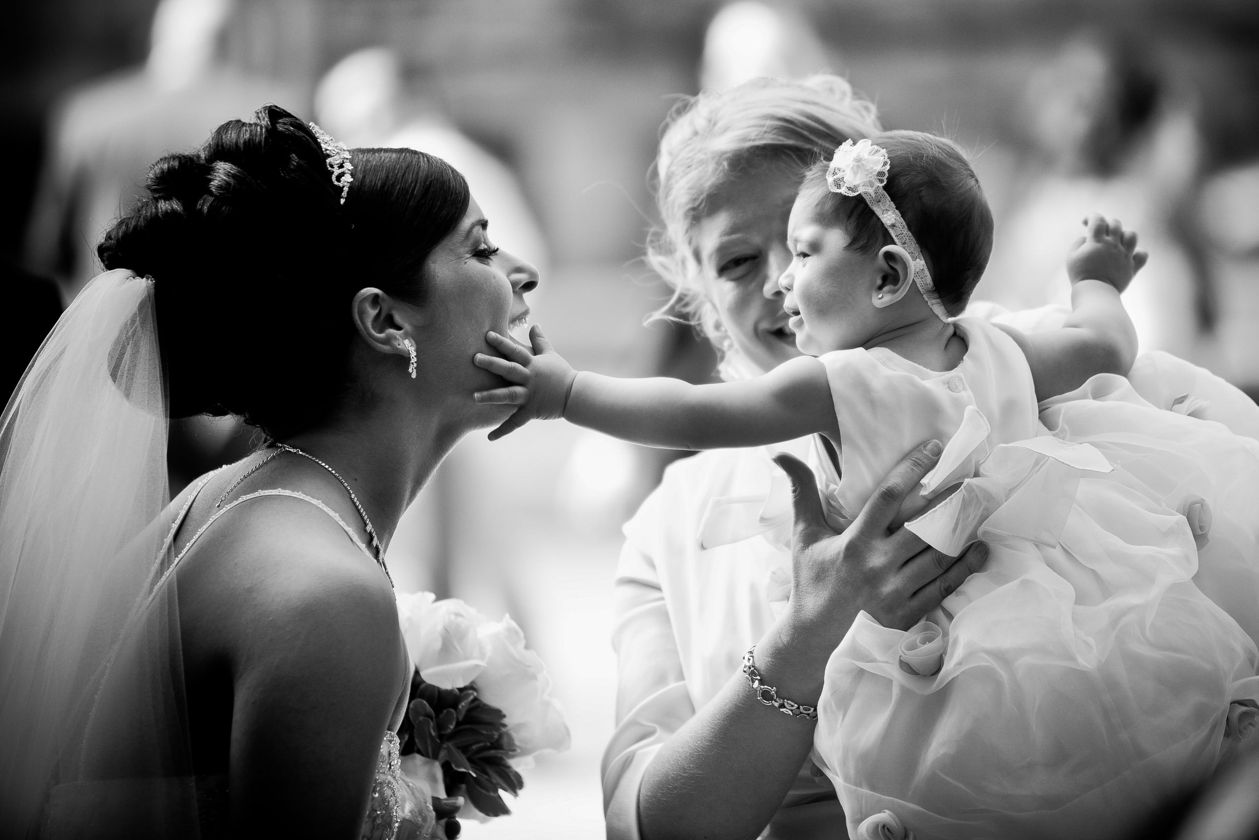 baby touching bride on wedding day (Copy)