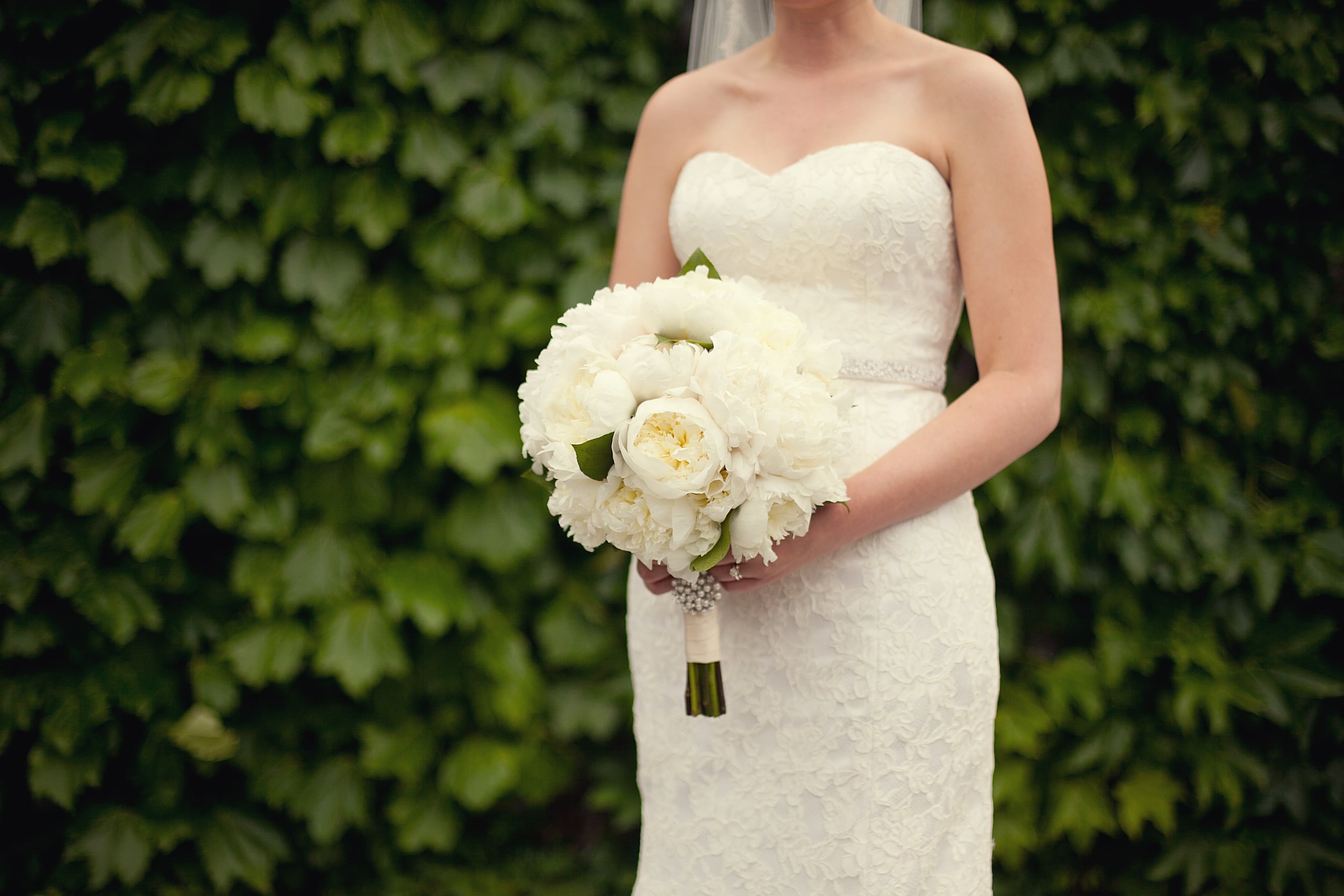 bride with bouquet at national art gallery in ottawa