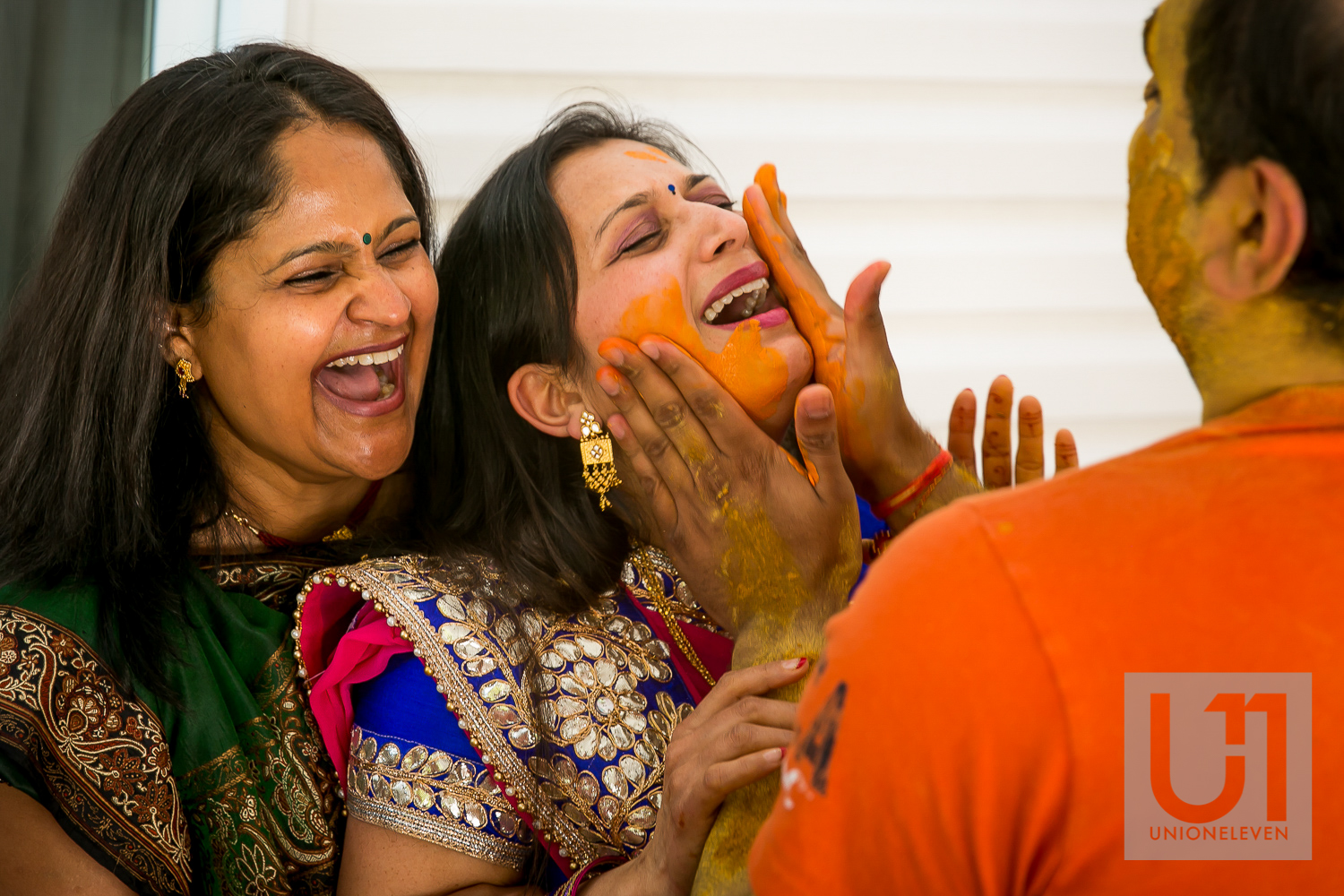  indian groom rubs pithi on his sisters face 