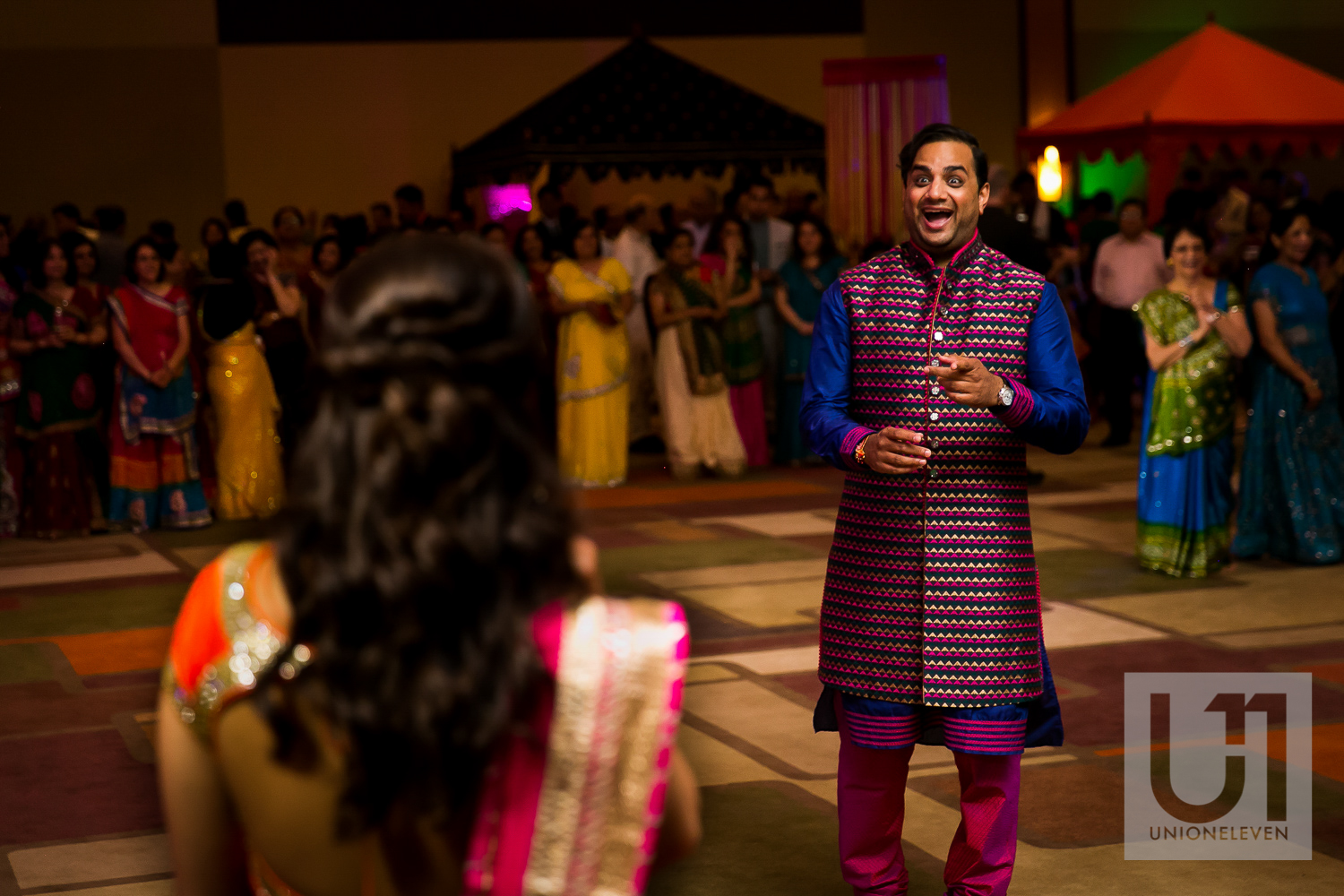 indian groom sees his bride at their wedding reception at the westin hotel