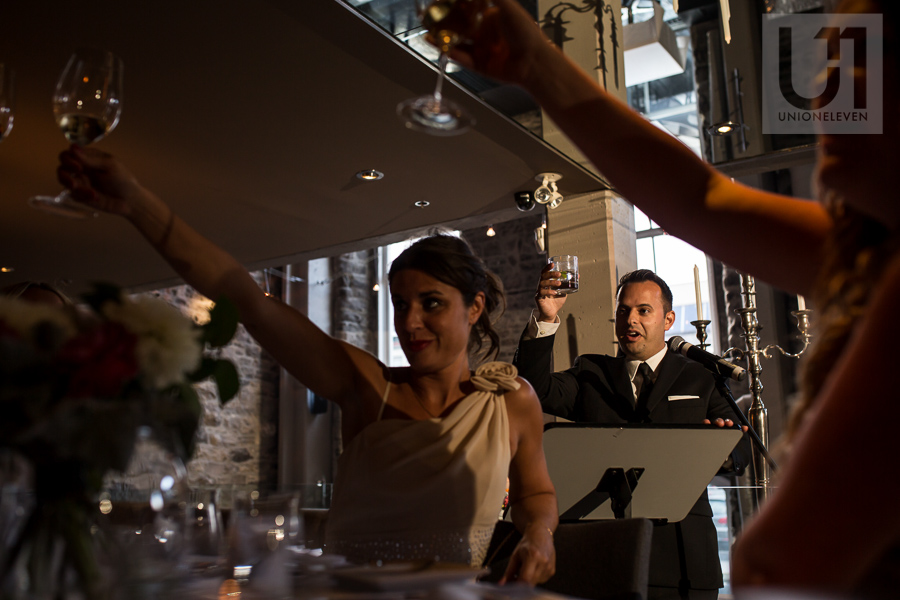 groomsman-toasting-after-speech-during-wedding-reception-at-eighteen-restaurant-in-ottawa